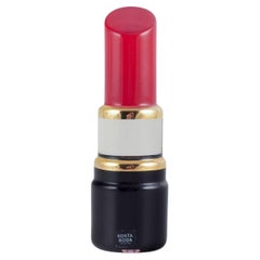 Åsa Jungnelius for Kosta Boda. ‘Make Up’ sculpture in the shape of a lipstick.