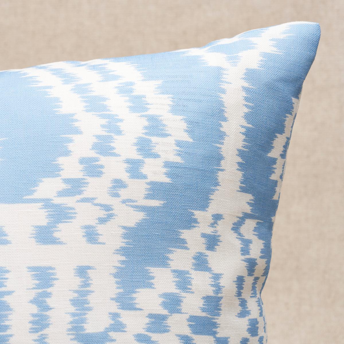 This pillow features Asaka Ikat with a knife edge finish. This relaxed, contemporary ikat is printed on unbleached linen. Pillow includes a feather/down fill insert and hidden zipper closure.
