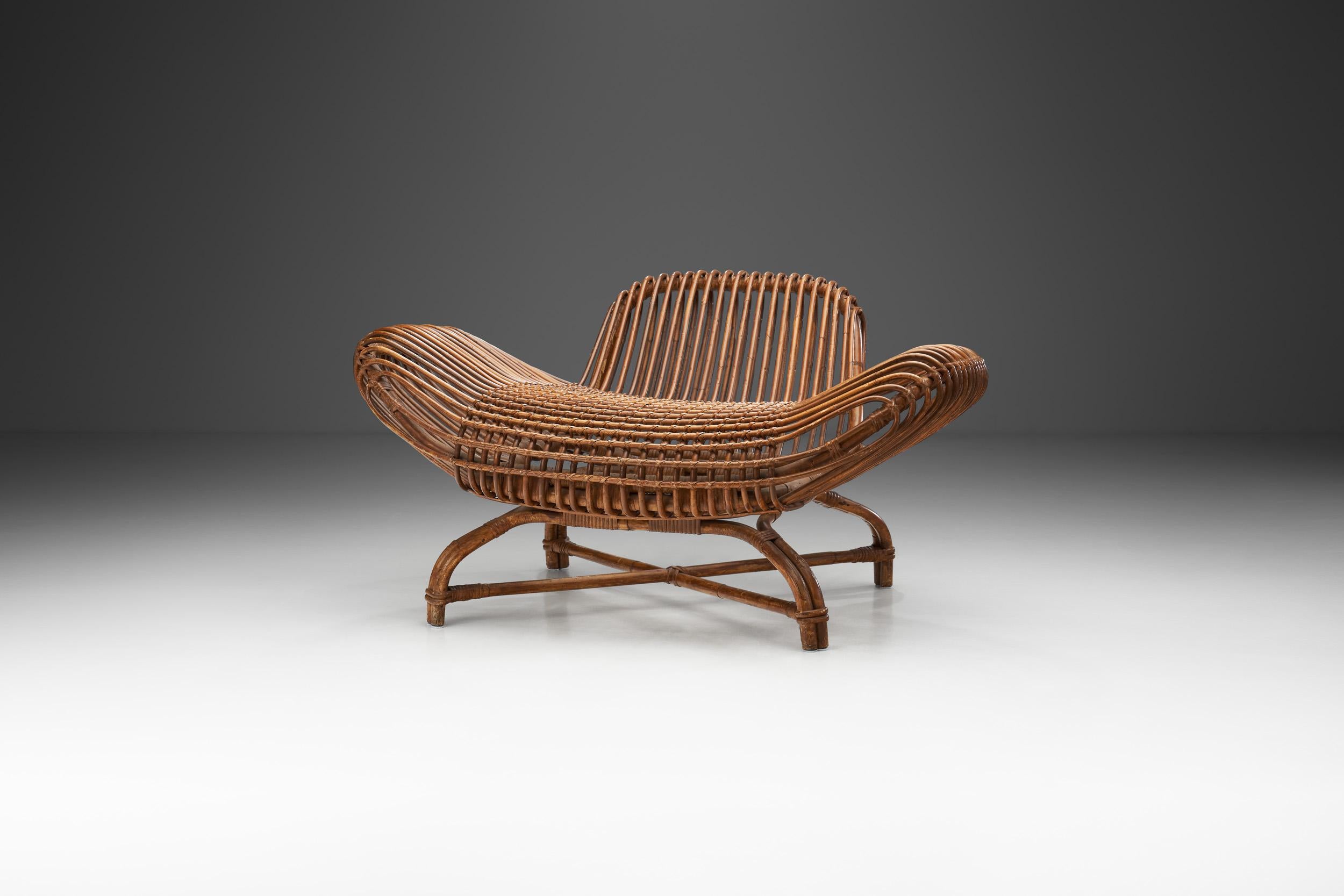 This very rare chair model was created around 1961 by Asanao Uematsu. The level of artistry of this chair might explain is rarity, as it is a design that was impossible to mass produce or even reproduce.

The quality of the handwoven wicker and