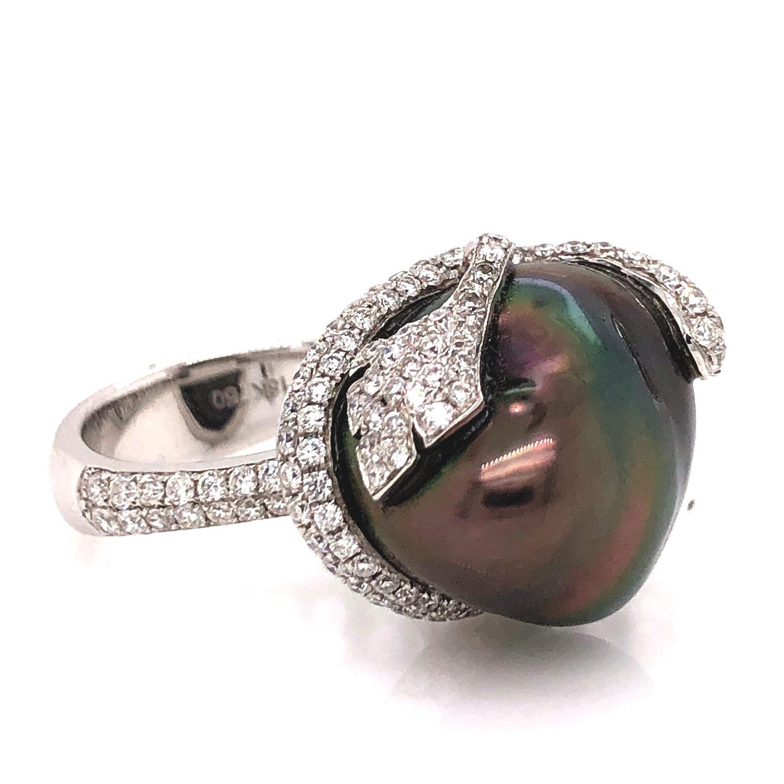 This ASBA Collection Ring features a AAA fine nacre and luster Tahitian Keshi Pearl, surrounded by a total of 1.29 ct. tw. of F Color, VS1 clarity pavé diamond accents. Expertly crafted in 14k white gold, this one-of-a-kind statement ring is sized