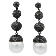 black pearl stud earrings with diamond pave Ascending Black Diamond Pavé Balls with White South Sea Pearl Drop Earrings