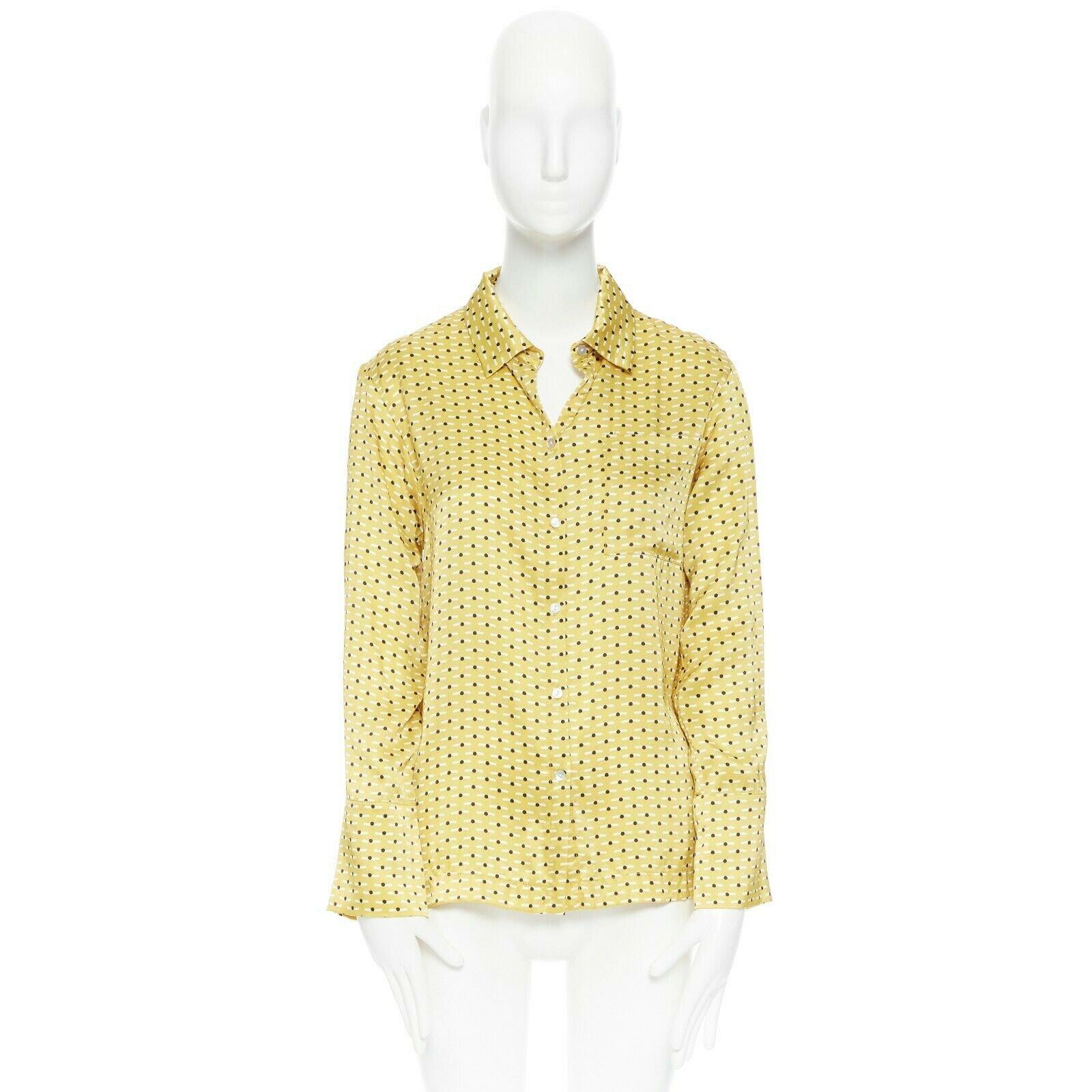 ASCENO yellow 100% silk polka dots graphic print pyjama button-up shirt XS 
Reference: LNKO/A01165 
Brand: Asceno 
Material: Silk 
Color: Yellow 
Pattern: Polka Dot 
Closure: Button 
Extra Detail: Silk shirt. Standard collar. Button front closure. 1