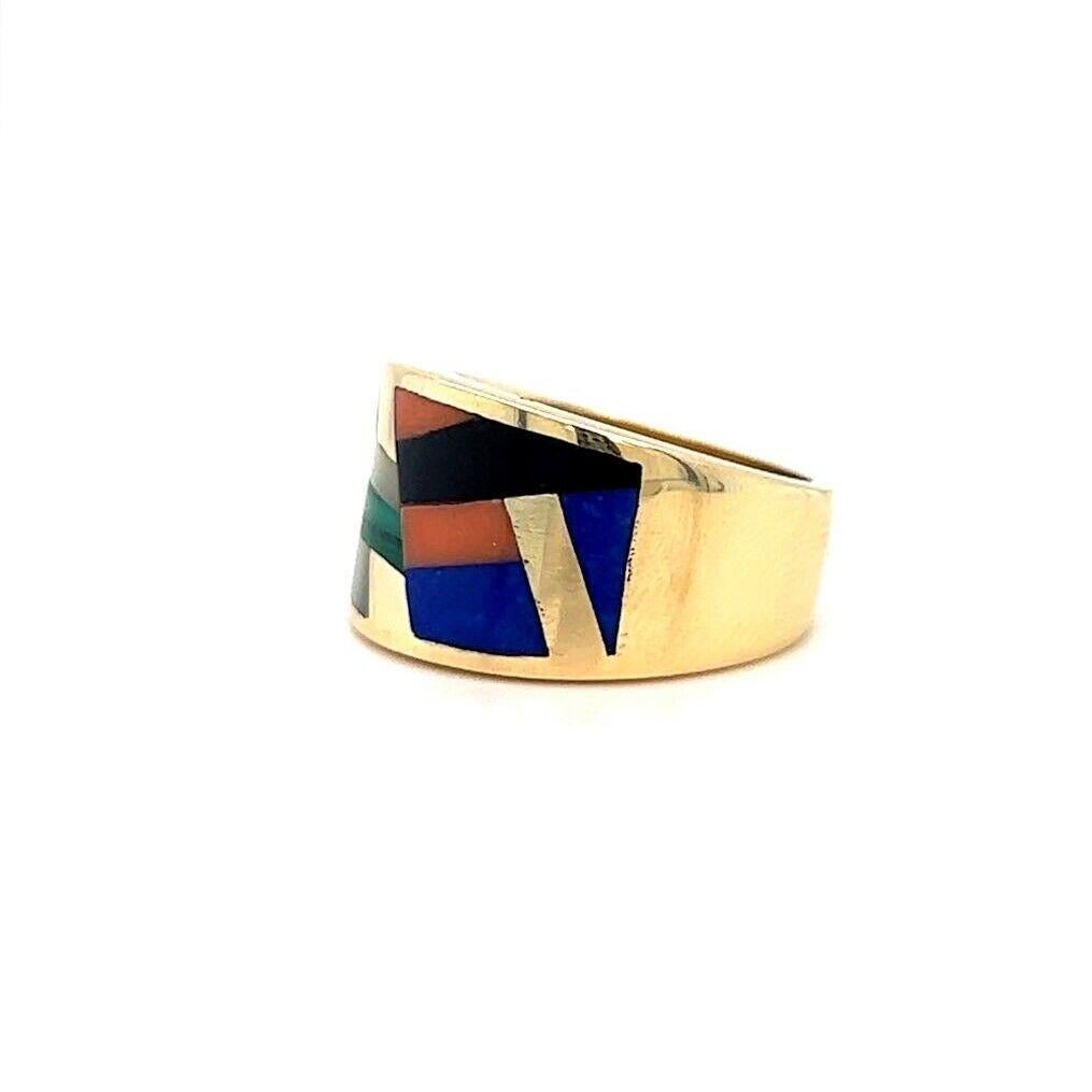 Asch Grossbardt 14k Yellow Gold Vintage Gemstone Inlay Ring Size 6.75

Condition:  Excellent Condition, Professionally Cleaned and Polished
Metal:  14k Gold (Marked, and Professionally Tested)
Weight:  9.6g
Gemstones:  Pearl, Malachite, Lapis