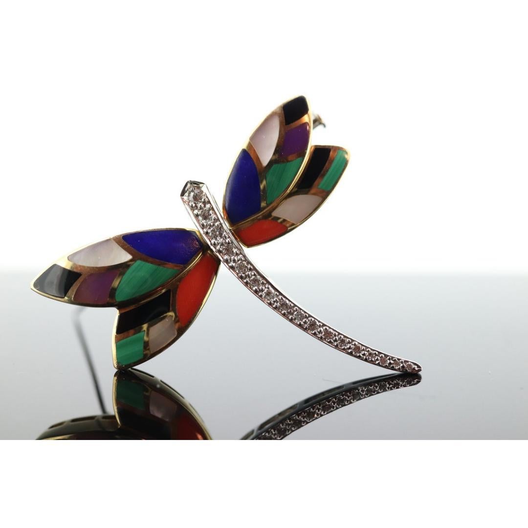 Vintage By
MATERIALIEN: Stein

Edelstein: Türkis

Atemberaubende Asch Grossbardt 18K Gelbgold Intarsien Edelstein und Diamant Dragon Fly BROOCH

Kann als Anhänger verwendet werden.

Zustand: Zeigt wenig bis keine