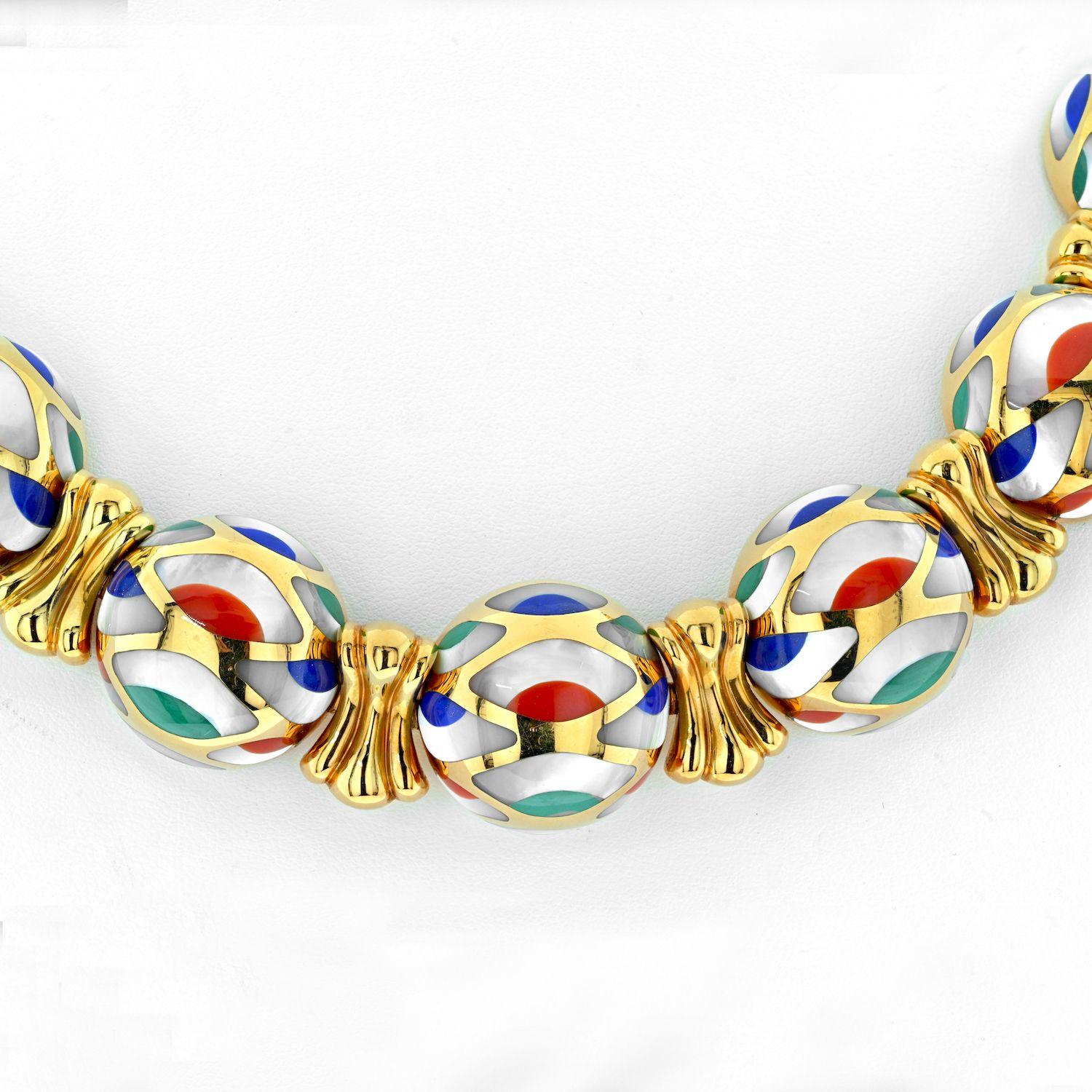 Asch Grossbardt 18K Yellow Gold Mother Of Pearl Multi-Color Enamel Necklace.
Mother-of-pearl, coral, lapis lazuli, and malachite plaques, 18k yellow gold, signed Asch Grossbardt.
Measurements of the necklace 49.2 cm (193/8 in). 
Each piece of Asch