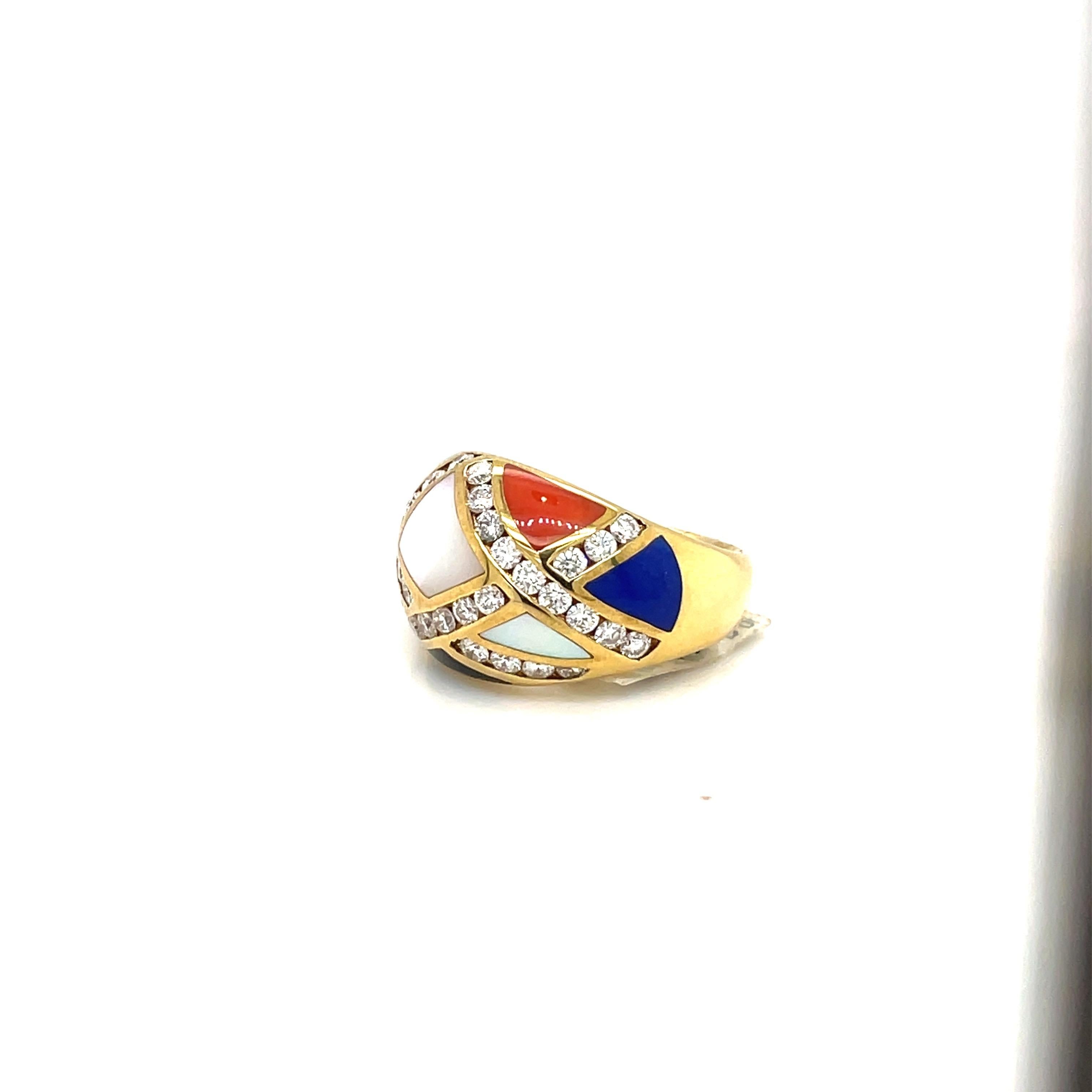 This lovely Asch Grossbardt ring is crafted in 18 karat yellow gold. The stunning dome shaped ring is set with geometric shapes of mother of pearl, coral, lapis, turquoise, malachite and onyx. Each section is outlined with round brilliant diamonds.