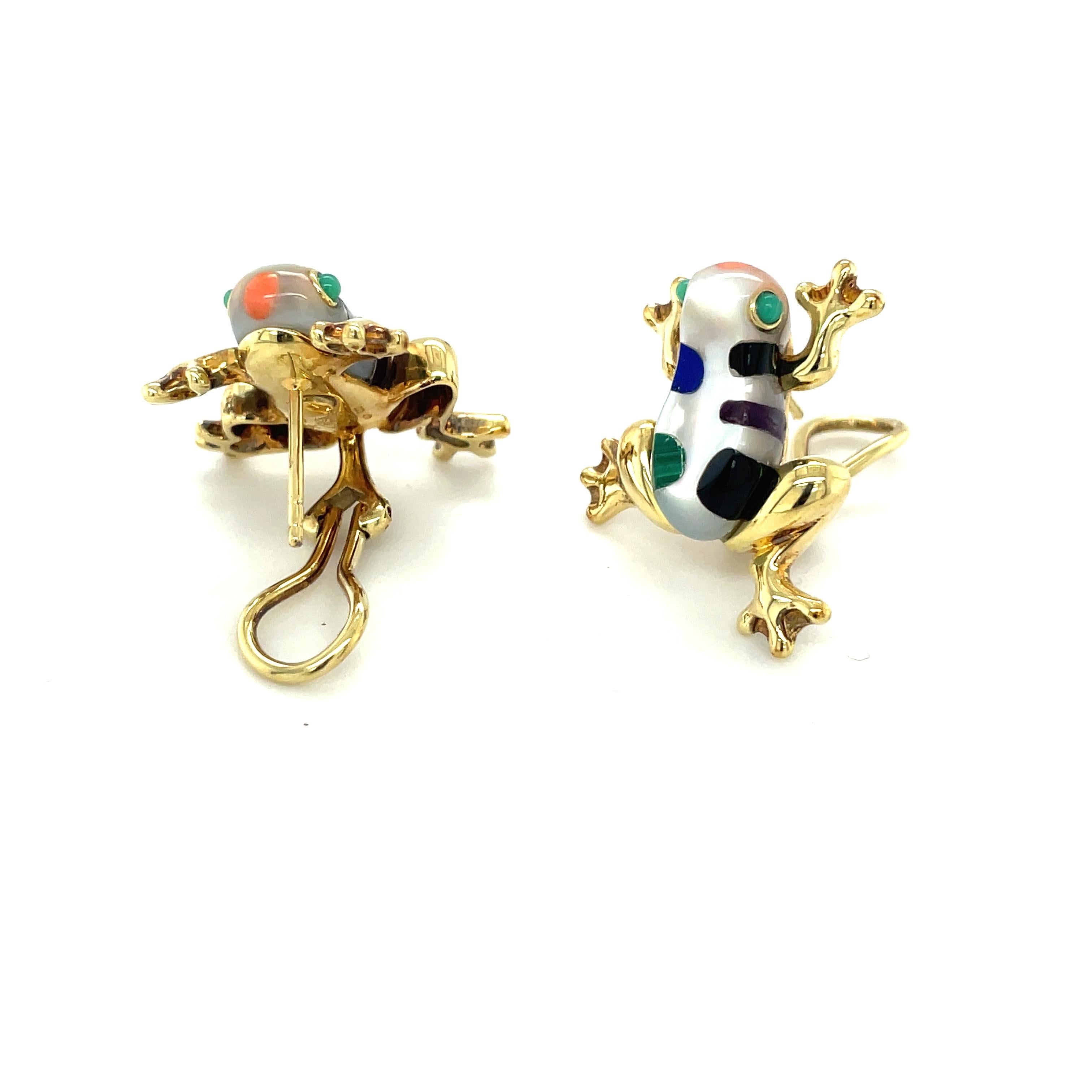 Designed by Asch Grossbardt these 18 karat yellow gold frog earrings are set with mother of pearl and inlaid with onyx, coral, malachite, lapis lazuli and jasper .
The frogs measure 7/8