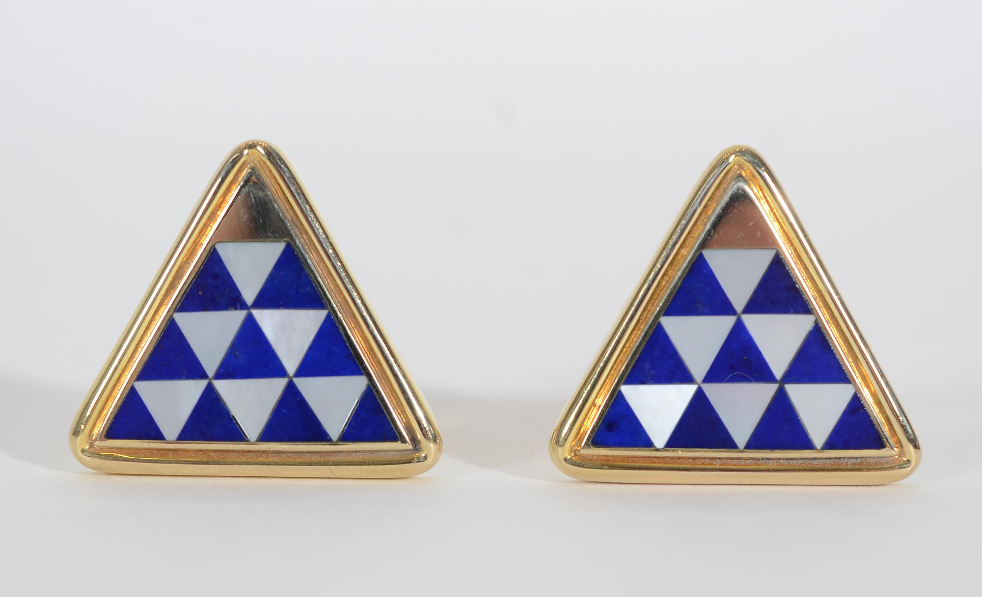 Beautifully made triangle shaped cufflinks by Asch Grossbardt. The interior triangles are made of Lapis lazuli; mother of pearl and gold. The backs are also inlaid with lapis as seen in last thumbnail photo. Measurements are 13/16
