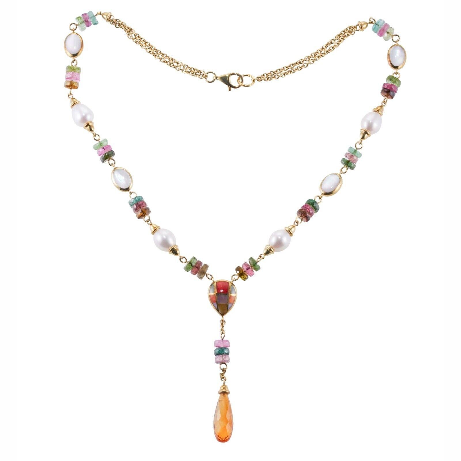 A 14k yellow gold necklace set with mother-of-pearl, coral, purple sugilite, tourmaline, citrine and pearls. Necklace- 16.5