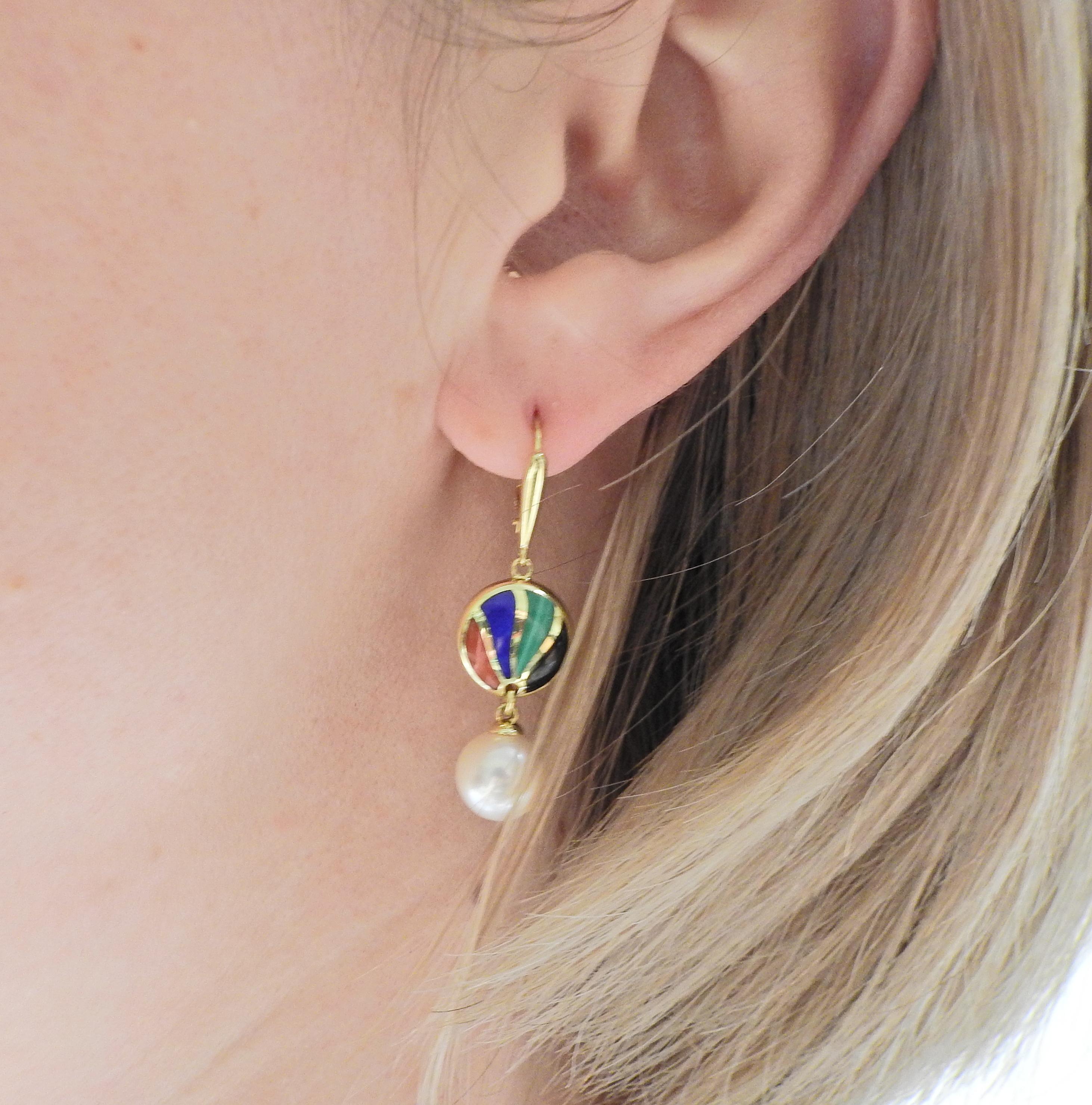 Pair of 14k gold Asch Grossbardt earrings, with 8.7mm pearls, inlay mother of pearl and onyx, lapis and malachite. Earrings are 40mm long. 6.6 grams.