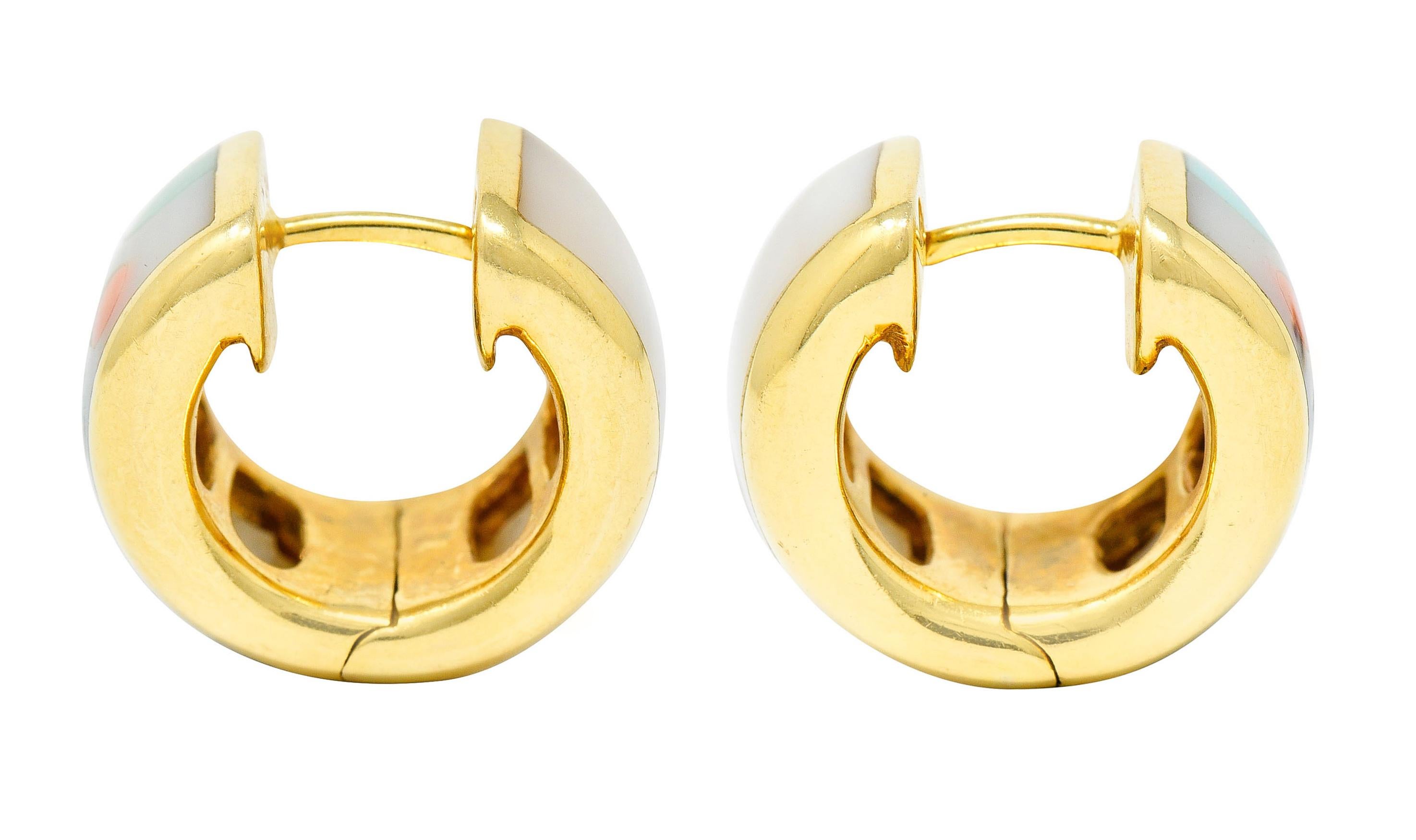 Huggie style earrings feature a polka dot inlay motif

With white mother-of-pearl and circles of lapis, coral, malachite, onyx, and other

Earrings open on a hinge and are completed by posts

Stamped 14K for 14 karat gold

Maker's mark for Asch