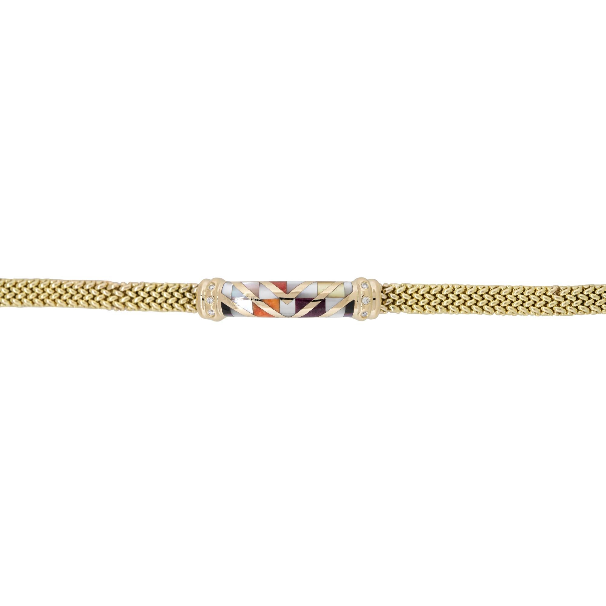 Asch Grossbardt 14k Yellow Gold Mother of Pearl, Onyx & Diamond Bracelet

Designer: Asch Grossbardt
Material: 14k Yellow Gold
Diamond Details: There are approximately 0.12 carats of round brilliant cut diamonds (6 stones)
Diamond Clarity: All