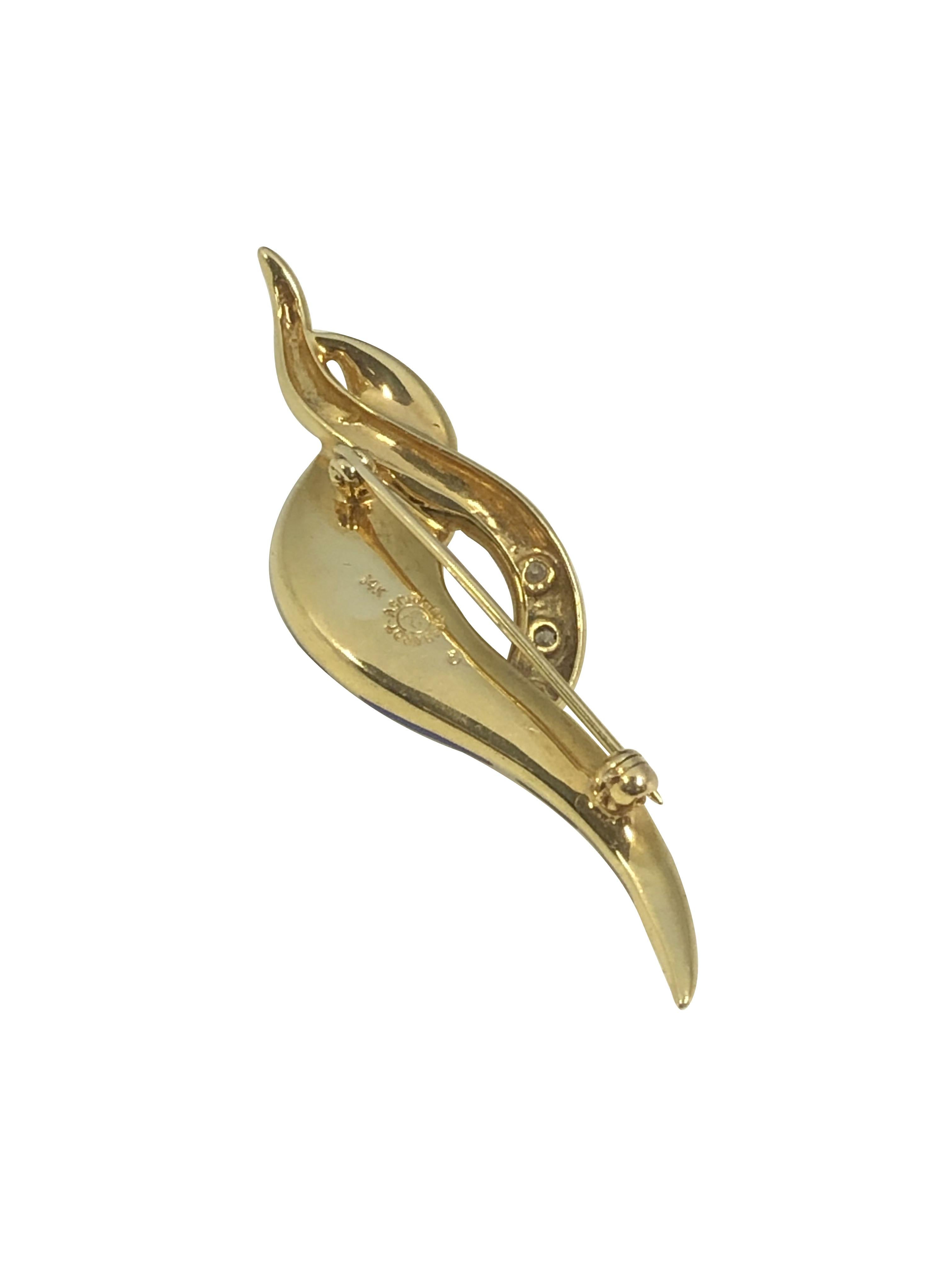 Circa 2000 Asche Grossbardt 14k Yellow Gold Brooch, measuring 2 1/4 inches in length X  5/8 inch. Set with Onyx, Lapis, Mother of Pearl, Opal and further set with Diamonds.