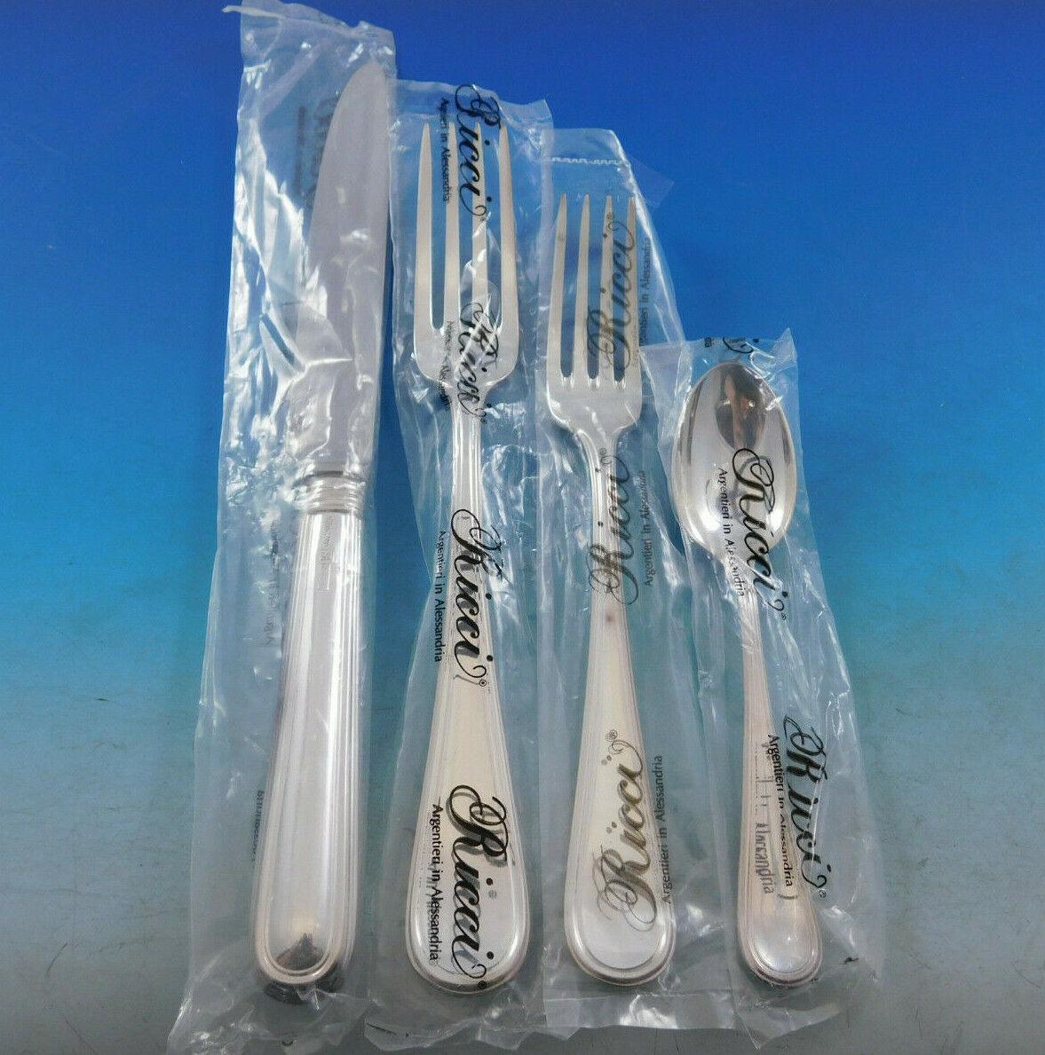 Gorgeous unused Ascot by Ricci 800 silver flatware dinner set - 76 pieces. This pattern is Continental size and heavy. This set includes:

12 Dinner knives, pointed, 9 3/4