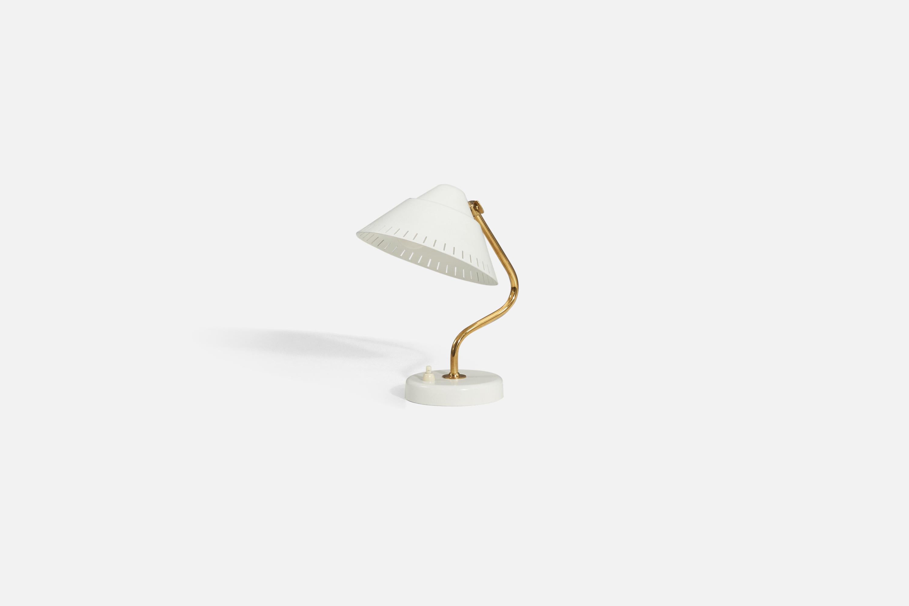 An adjustable table lamp with lacquered metal base and shade and a brass stem. Designed and produced by ASEA, Sweden, 1950s-1960s.
 