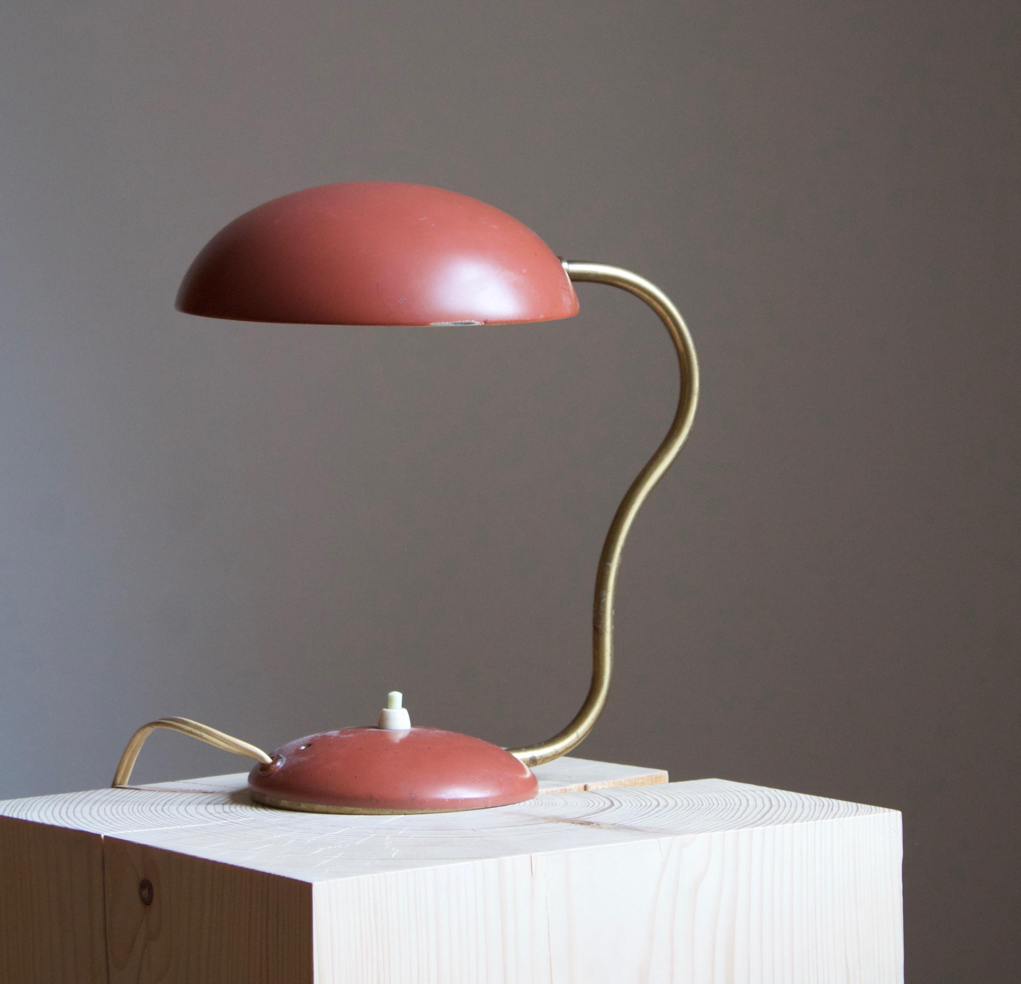 A small organic and adjustable table lamp / desk light. Produced by Asea, 1950s. Features brass and red lacquered metal. 

Electrical plug for Swedish outlets. 

Other designers of the period working in similar style include Hans Bergström,