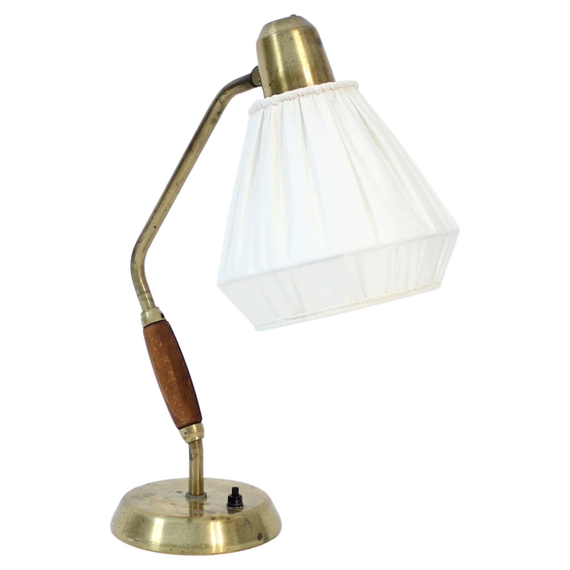 ASEA, brass and teak desk / table lamp, 1950s For Sale