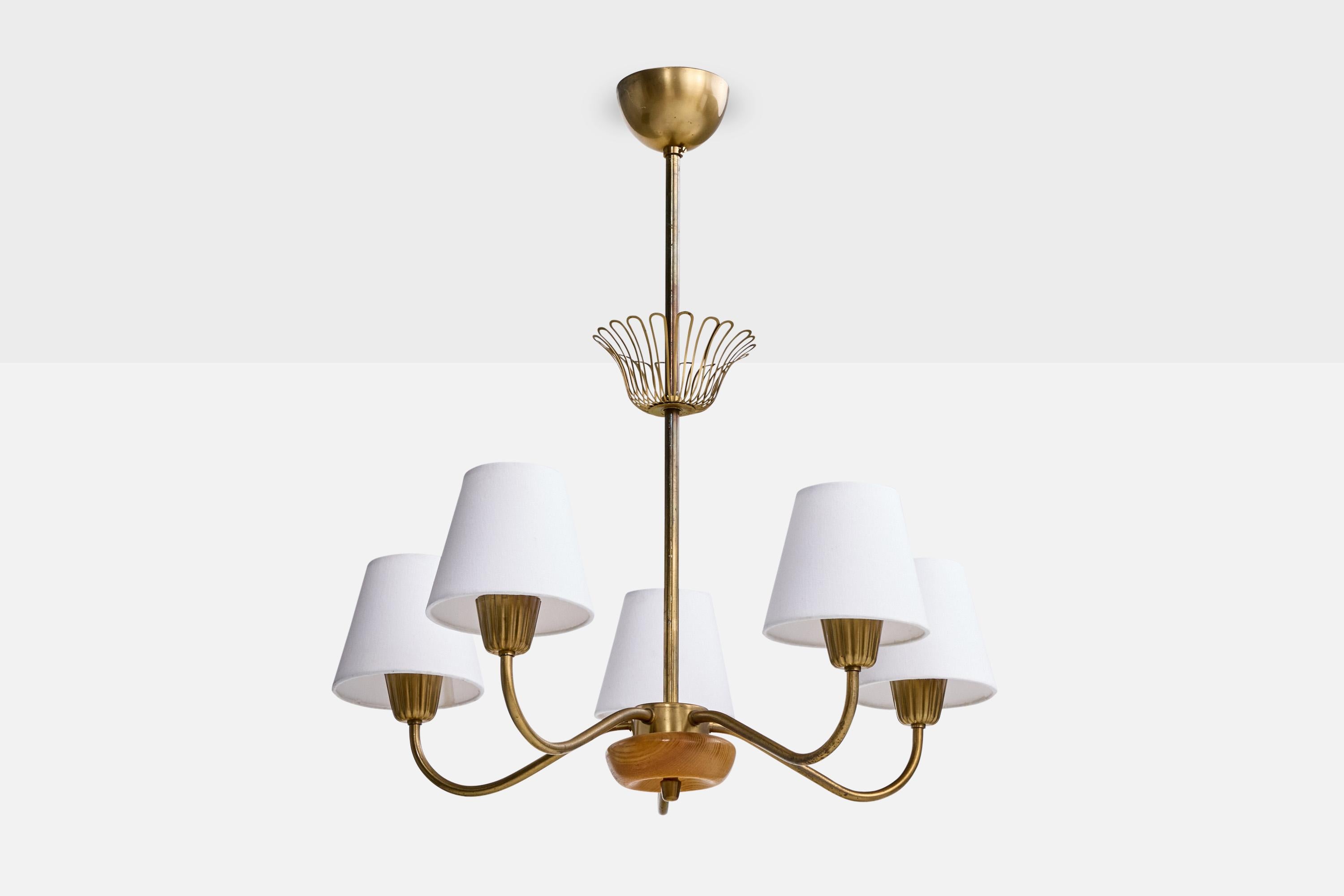 An oak, brass and white fabric chandelier designed and produced by ASEA, Sweden, c. 1950s.

Overall Dimensions (inches): 25.0