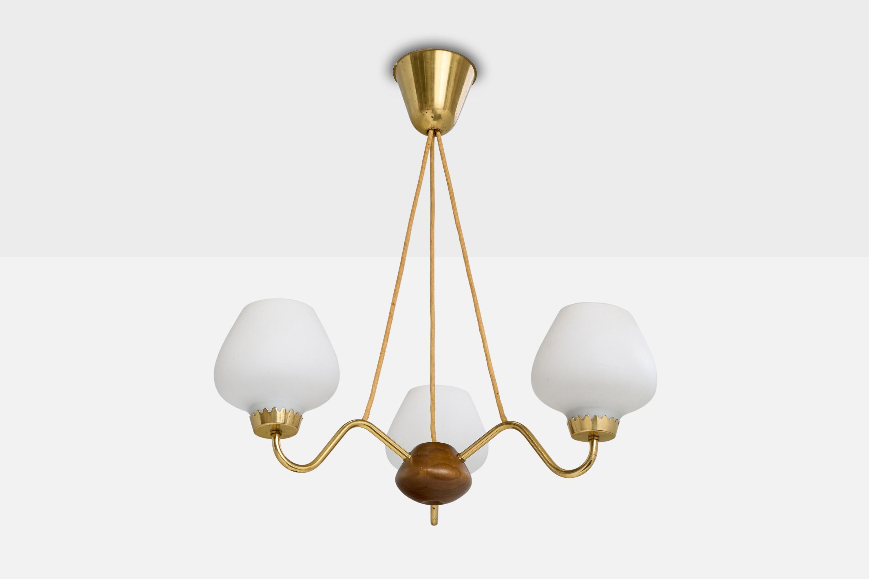 A three-armed brass, oak and white opaline glass chandelier designed and produced by ASEA, Sweden, c. 1950s.

Overall Dimensions (inches): 24” H x 18” Diameter

Dimensions of Canopy: 3.9” H x 4.625” Diameter 

Cord length: 17” H

Bulb