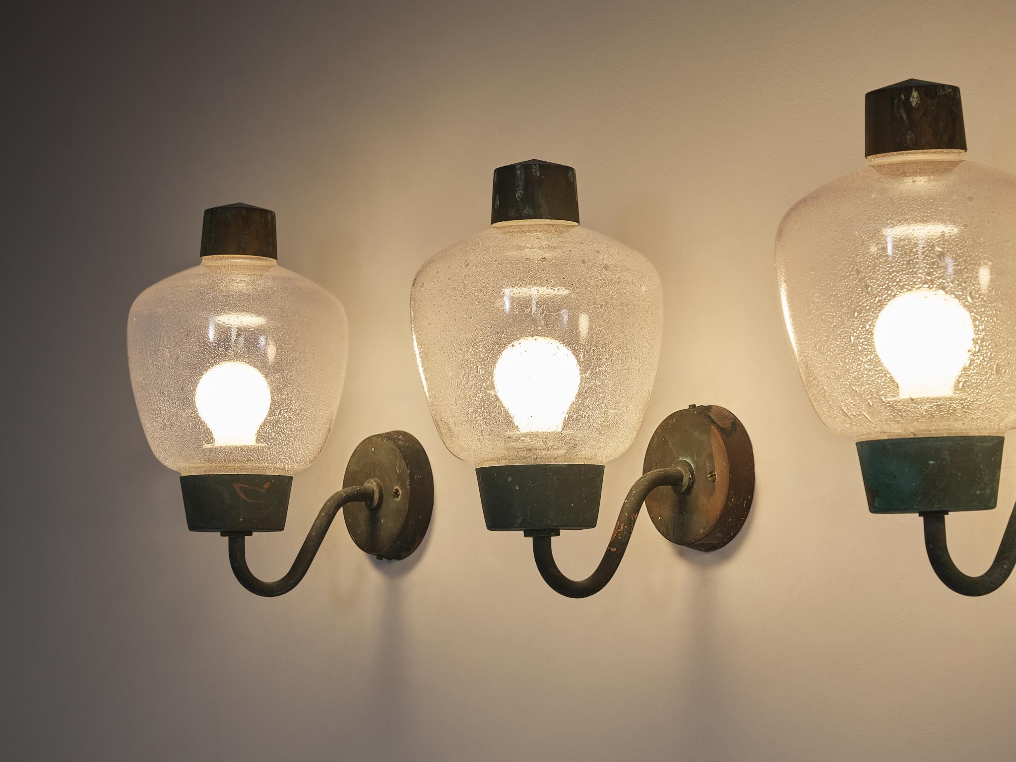 Asea Elektroskandia, wall lights, brass, lacquered metal, Sweden, 1950s

These wall lights crafted from patinated copper and glass, are showcasing a design typical of mid-20th-century Scandinavian craftsmanship. These lights were made in Sweden