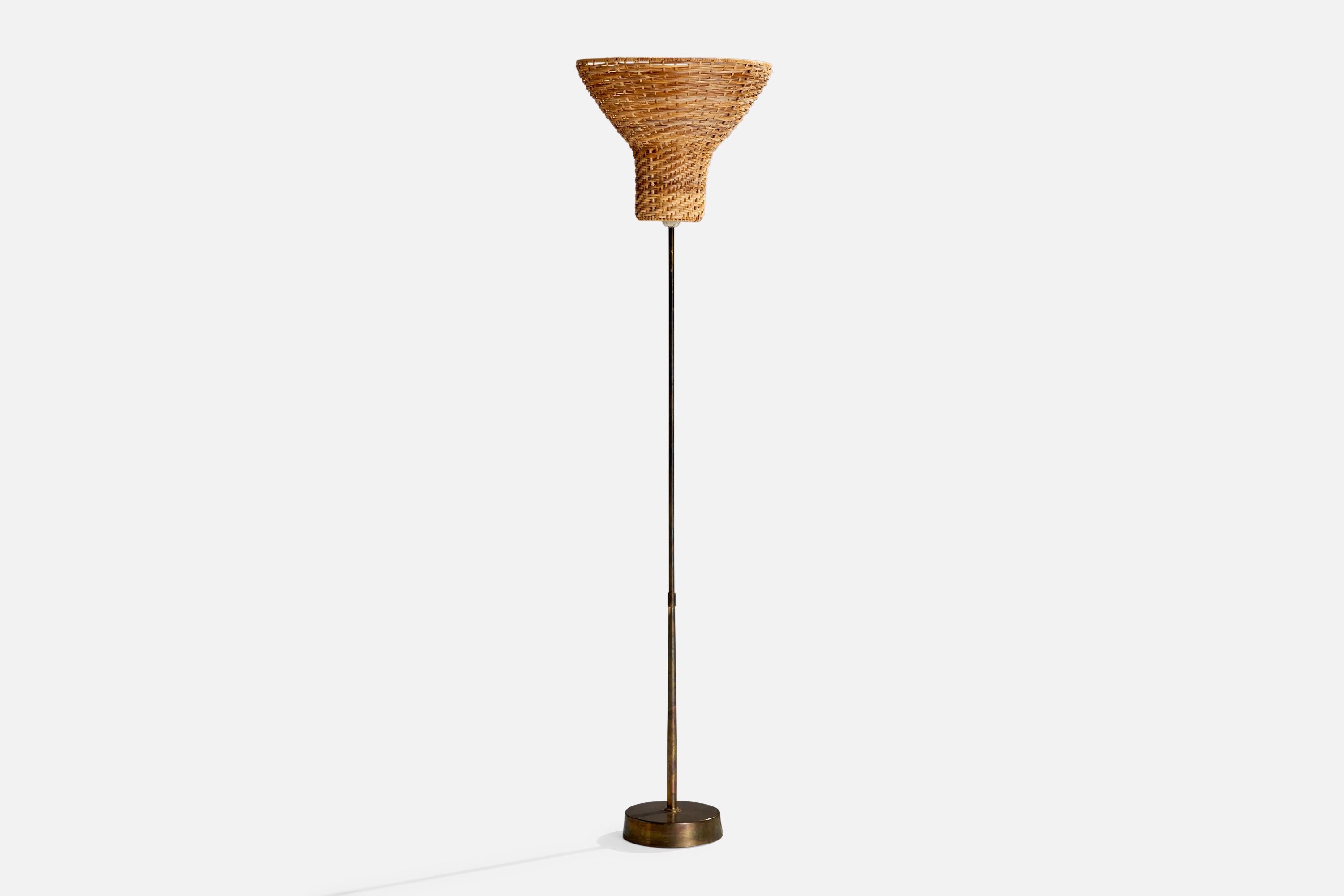 A brass and rattan floor lamp designed and produced by ASEA, Sweden, 1940s.

Overall Dimensions (inches): 54.34”  H x 13.39” W x 13.39” D
Stated dimensions include shade.
Bulb Specifications: E-26 Bulb
Number of Sockets: 1
All lighting will be