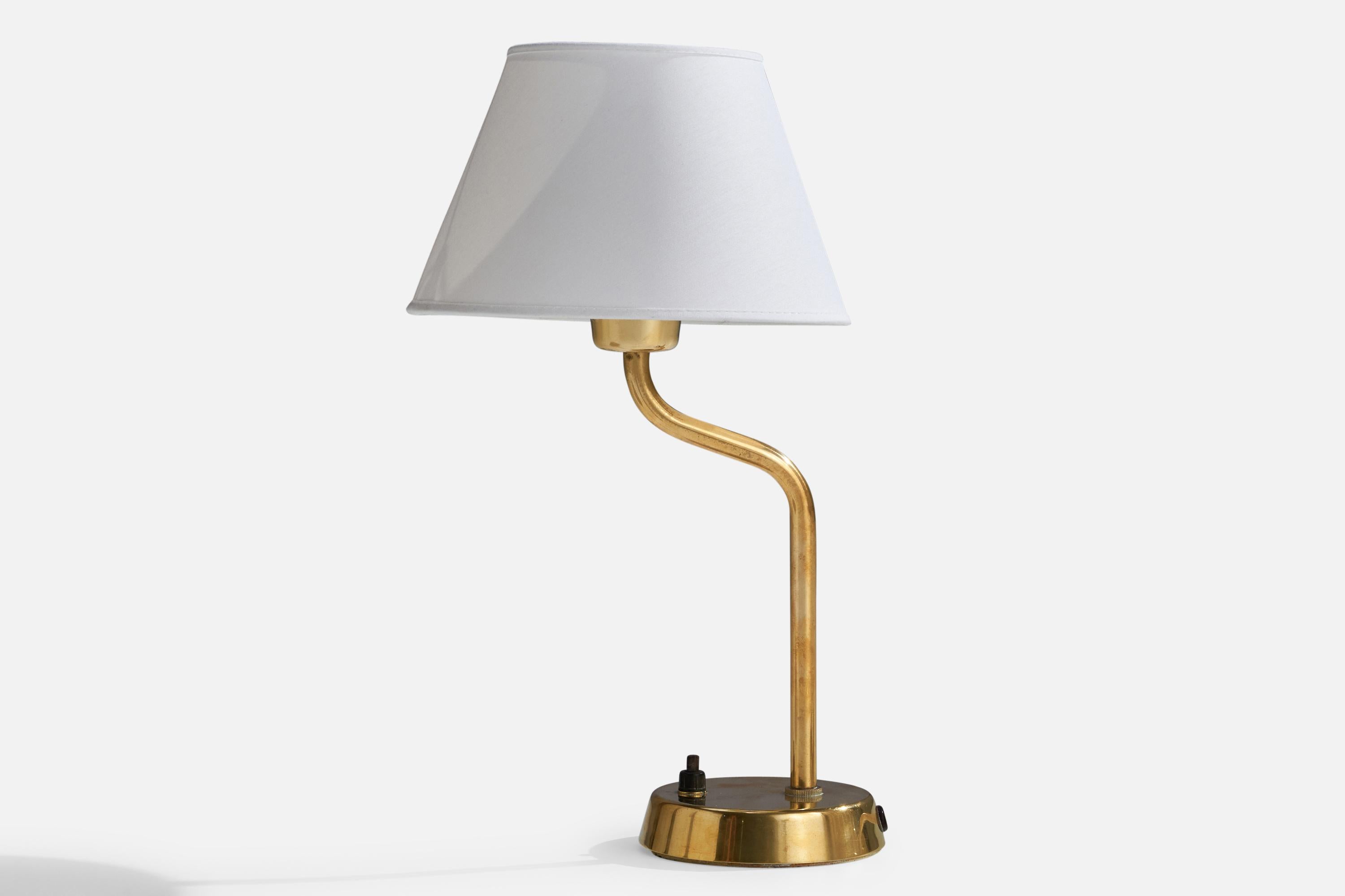 A brass and white fabric table lamp designed and produced by ASEA, Sweden, 1940s.

Dimensions of Lamp (inches): 12” H x 4.75” Diameter
Dimensions of Shade (inches): 4.75” Top Diameter x 8.25”Bottom Diameter x 5.25” H
Dimensions of Lamp with Shade