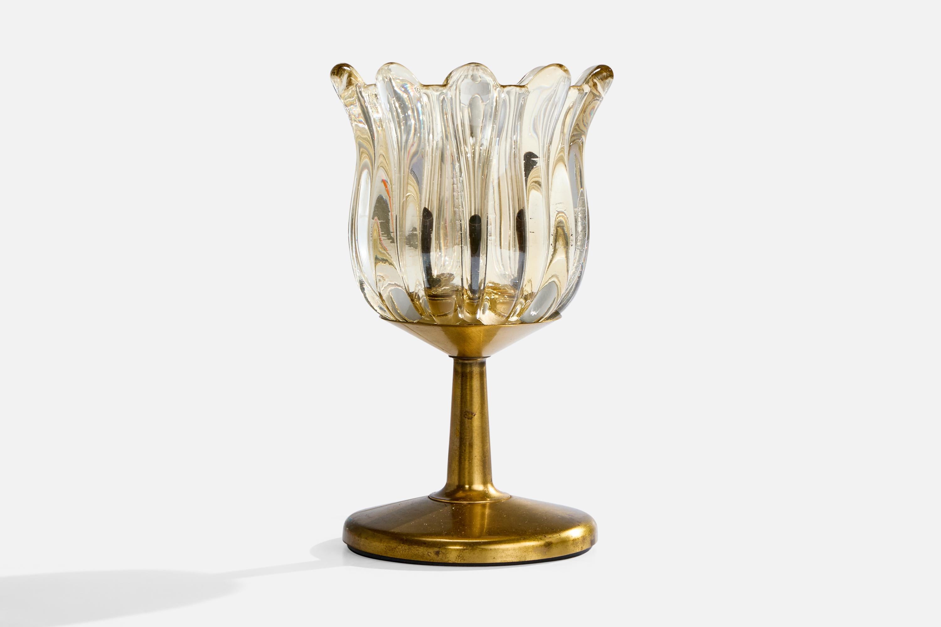 A brass and glass table lamp produced by ASEA, Sweden, c. 1950s.

Dimensions of Lamp with Shade (inches): 8.125