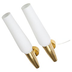 Asea wall lights a pair in brass and glass Sweden 1960