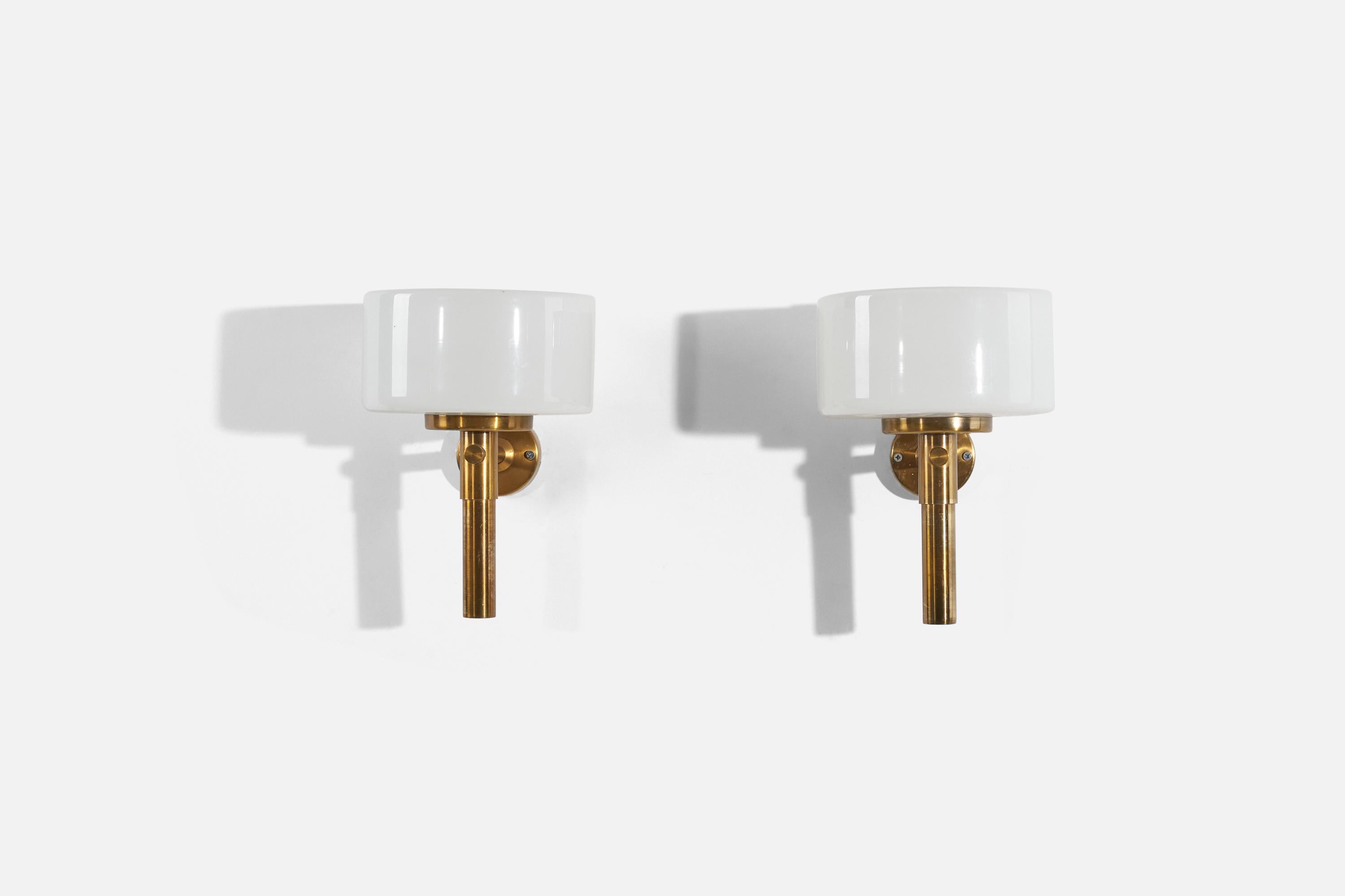 A pair of brass and milk glass wall lights designed and produced by ASEA, Sweden, 1950s.

Dimensions of the back plate (inches) : 2.9375 x 2.9375 x .75 (H x W x D)
Does not come with screws.