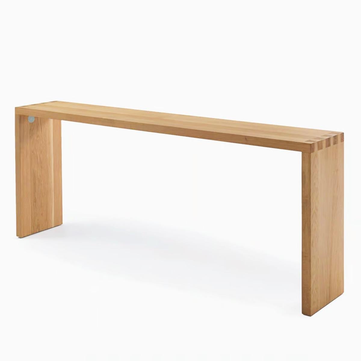 Console Table Aselta Oak with all structure in solid
oak in natural finish with dovetail joint between the 
legs and the top.
Also available on request in:
L180xD35xH85cm, price: 4400,00€
L200xD35xH85cm, price: 4800,00€
L220xD35xH85cm, price: