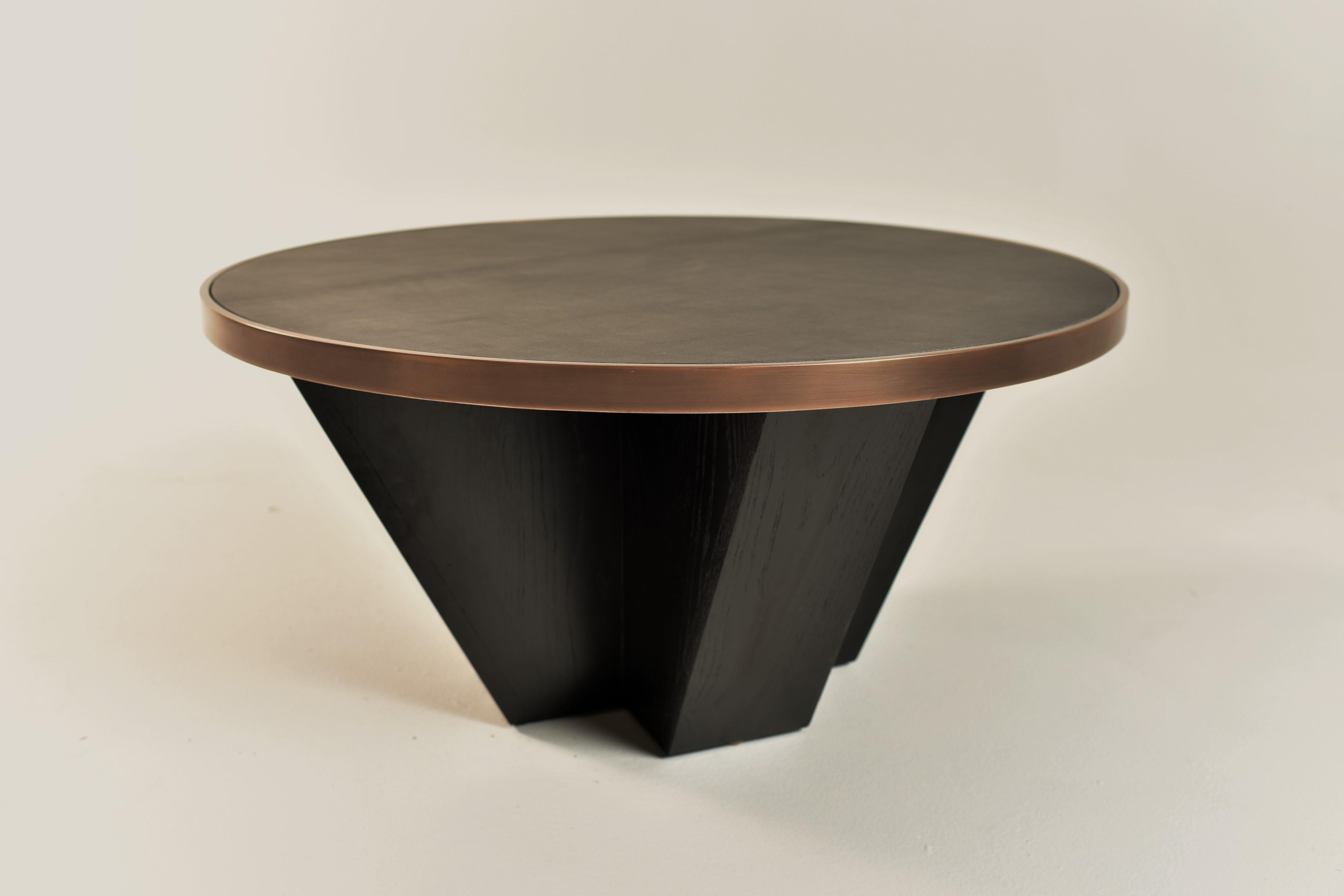 Ash and brass Venus coffee table by Jason Mizrahi.
Dimensions: diameter 81.28 x height 38 cm.
Materials: Stained ash, leather top, brass coated frame.

Jason Mizrahi is a designer of contemporary furniture. He was born and raised in Los Angeles,
