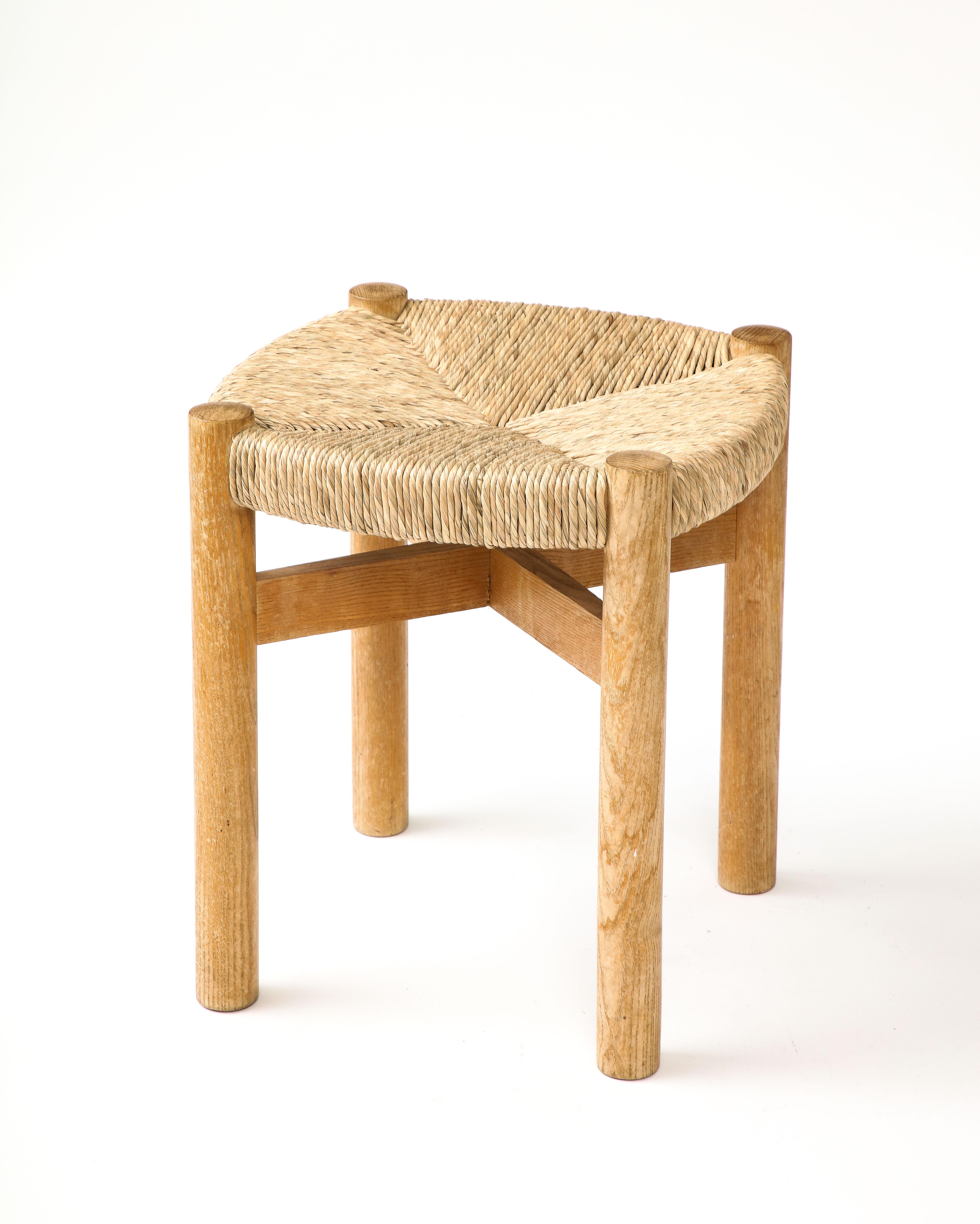 Ash and rush stool by Charlotte Perriand. A second, slightly taller, stool is also available. 