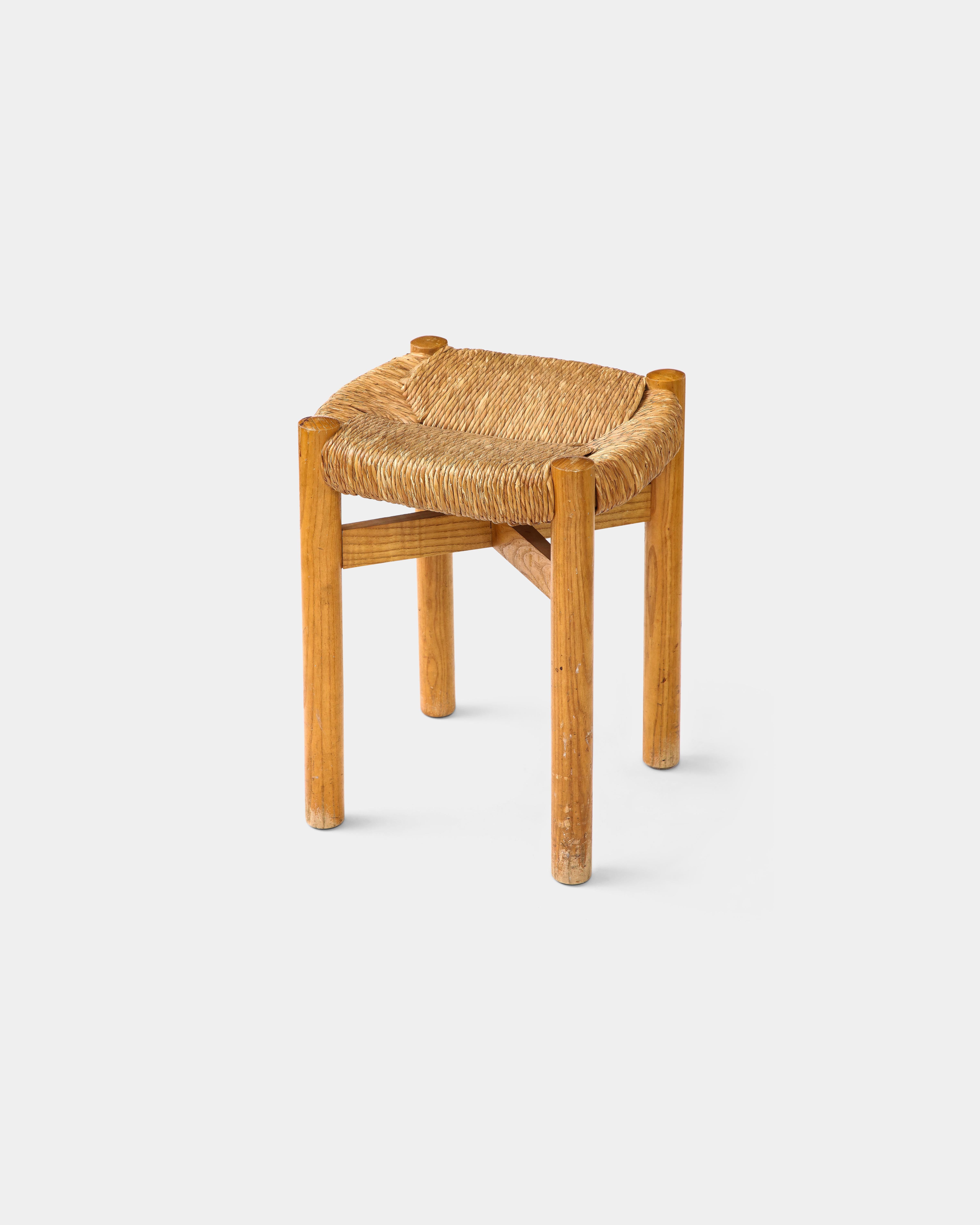 Woven rush and ash stool by Charlotte Perriand. Another, slightly lower, stool is also available.