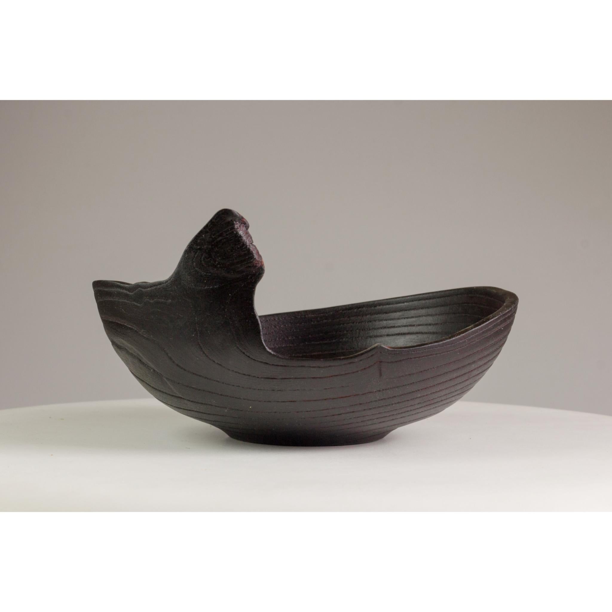 Ash bowl by Vlad Droz.
Dimensions: ?19 x H10 cm.
Materials: Ash.
One of a kind. 

Ash Bowl by Russian Vlad Droz. This bowl is greenturned, charred and sandblasted.

Vlad Droz
