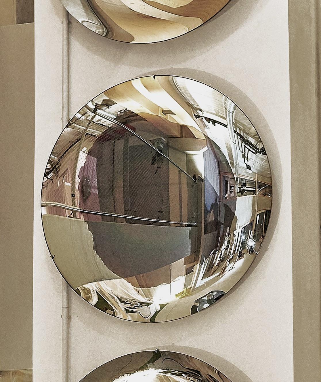 Ash Convex Sculptural Silver and Glass Mirror by Homa
Dimensions: D 97 x H 7 cm
Materials: Convex Smoke and Silver Mirror.

HOMA is a contemporary design atelier based in Istanbul. The atelier’s trademark processes are handblown glass, glass fusing