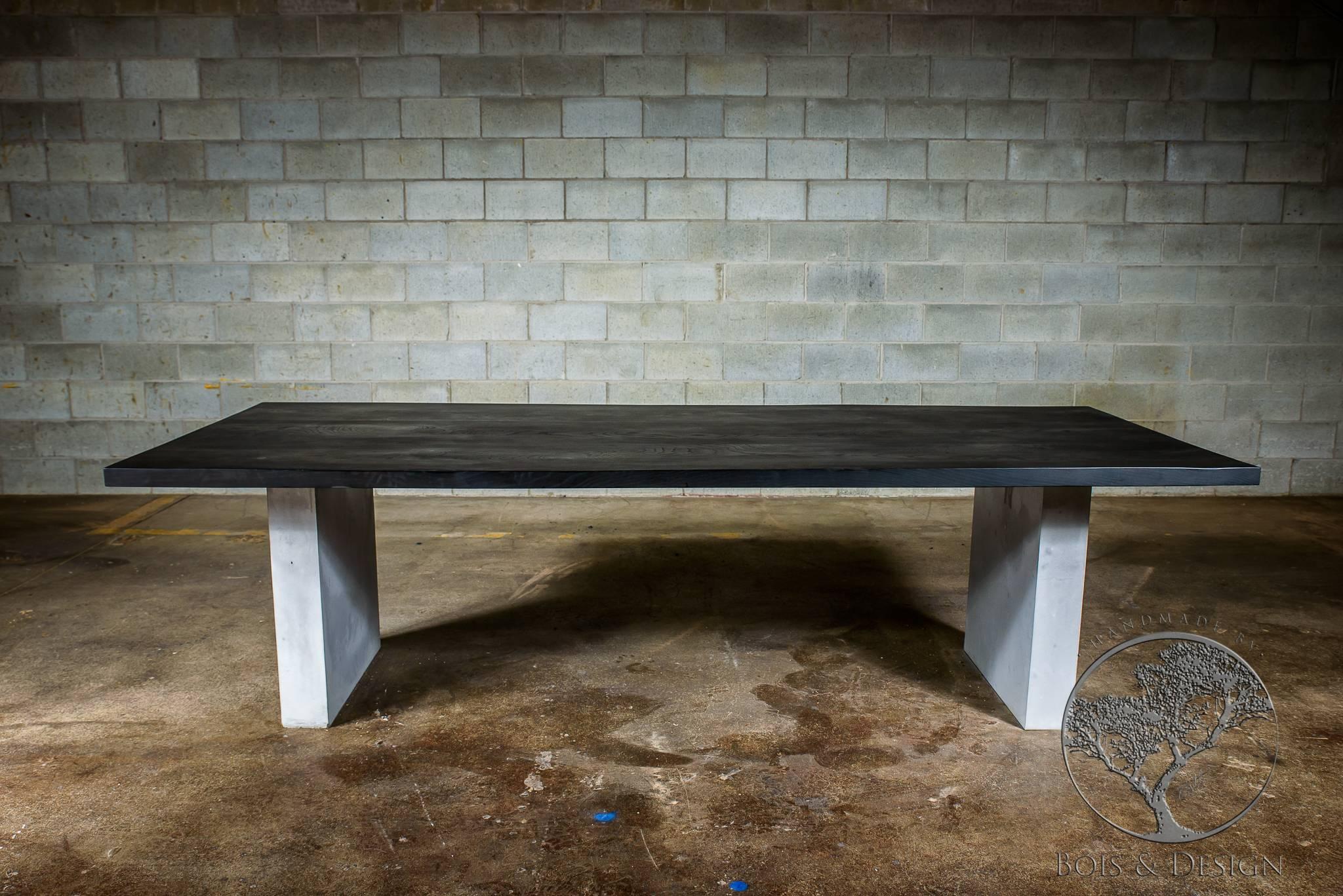 Ash is such an amazing wood because of the grain pattern. Stained black makes it even more glamour. This dining table sits on applied concrete legs which makes them very light compare to standard concrete legs. Our motto, Enhancing wood’s natural