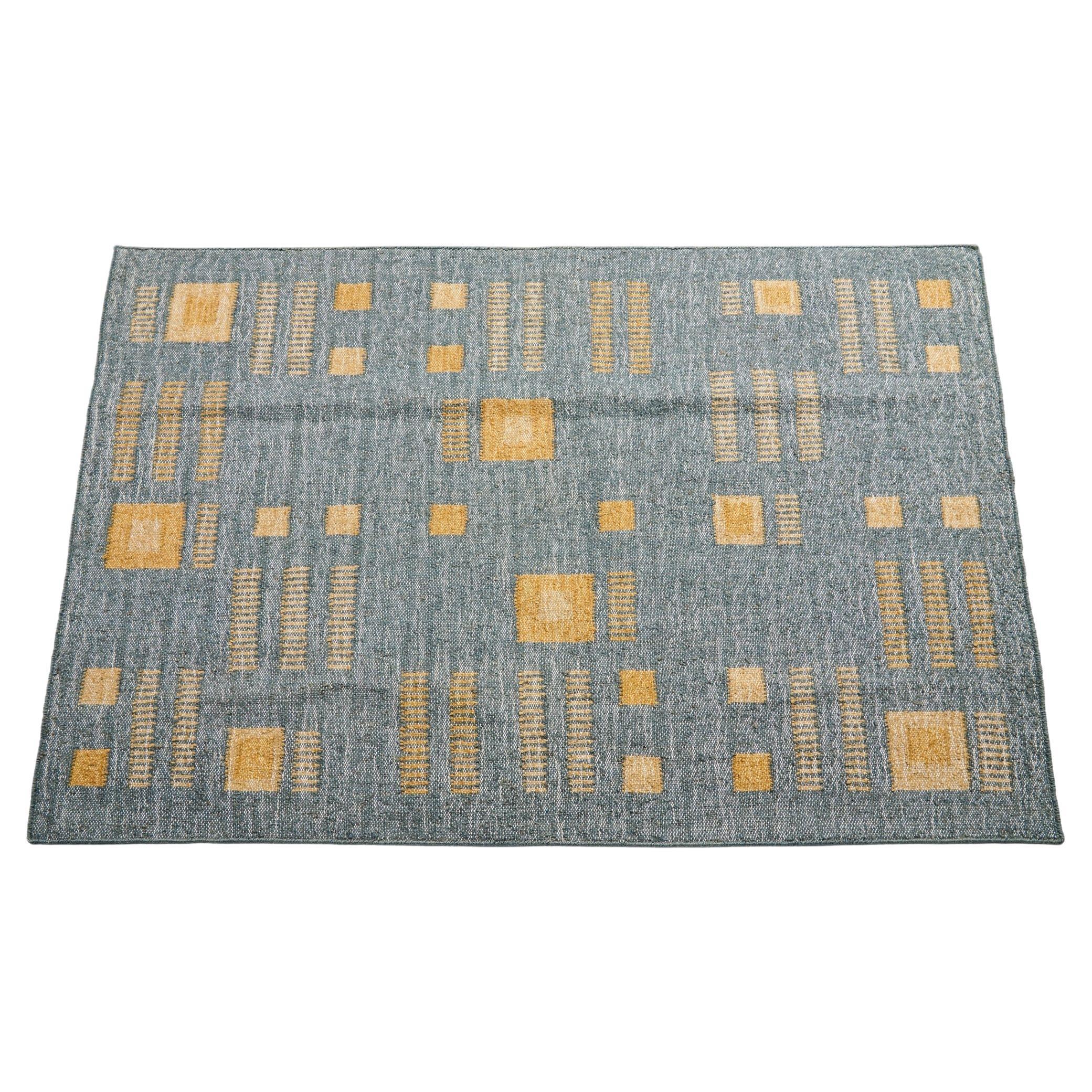 Ash Alfombra india de yute tejida a mano con motivos geométricos en tonos terrosos de azul , gris