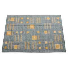 Ash Alfombra india de yute tejida a mano con motivos geométricos en tonos terrosos de azul , gris