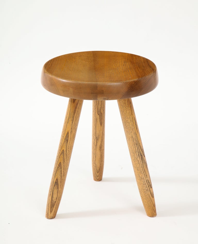 Ash Stool by Charlotte Perriand, France, Mid-20th Century 

This iconic stool consists of a solid ash construction, round seat top, and tripod base.
 