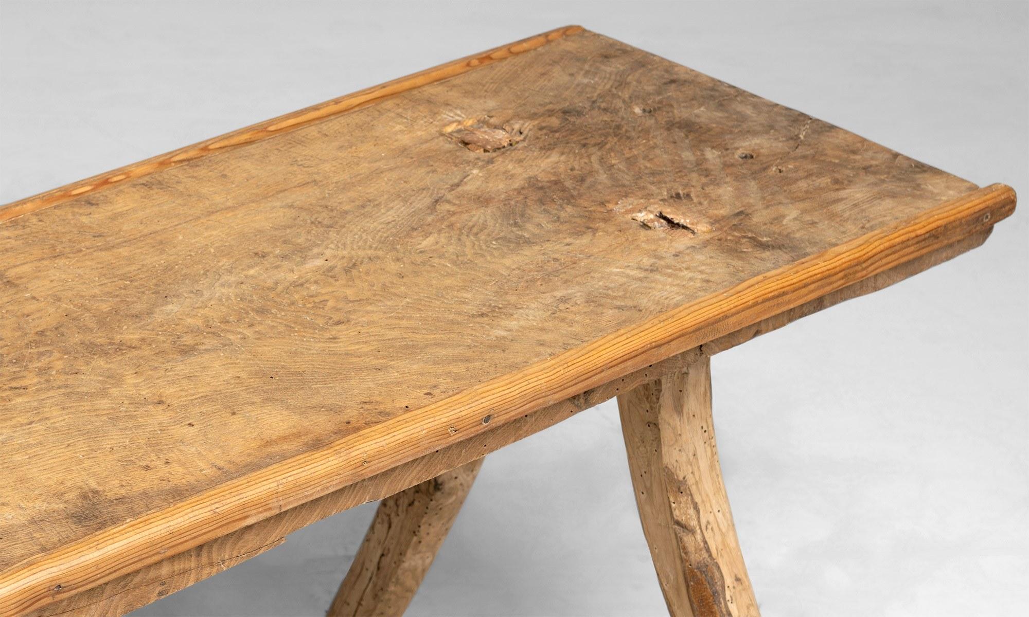 Ash Tripod Table

Spain circa 1890

Three-legged primitive side table constructed from ash.

Measures: 52”L x 25.5”D x 23.75” H.
