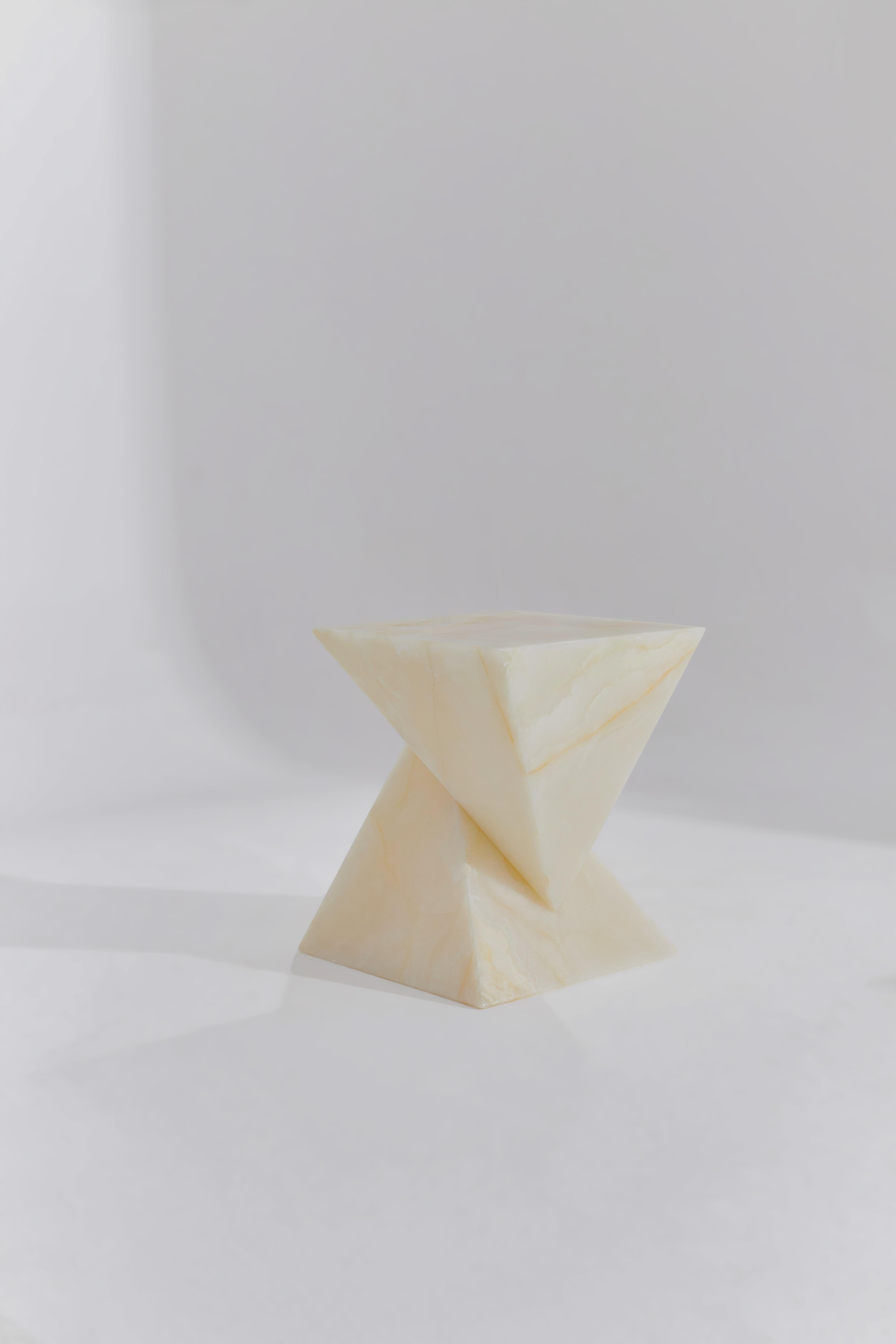 Ash White Onyx Side Table by RAFFINATO
Dimensions: D 42,5 x W 50 x H 50 cm.
Materials: White onyx.

This table is available in different stone options: White Travertine, Rosso Levanto, Amethyst, and white/blue/green/pink Onyx. Please contact