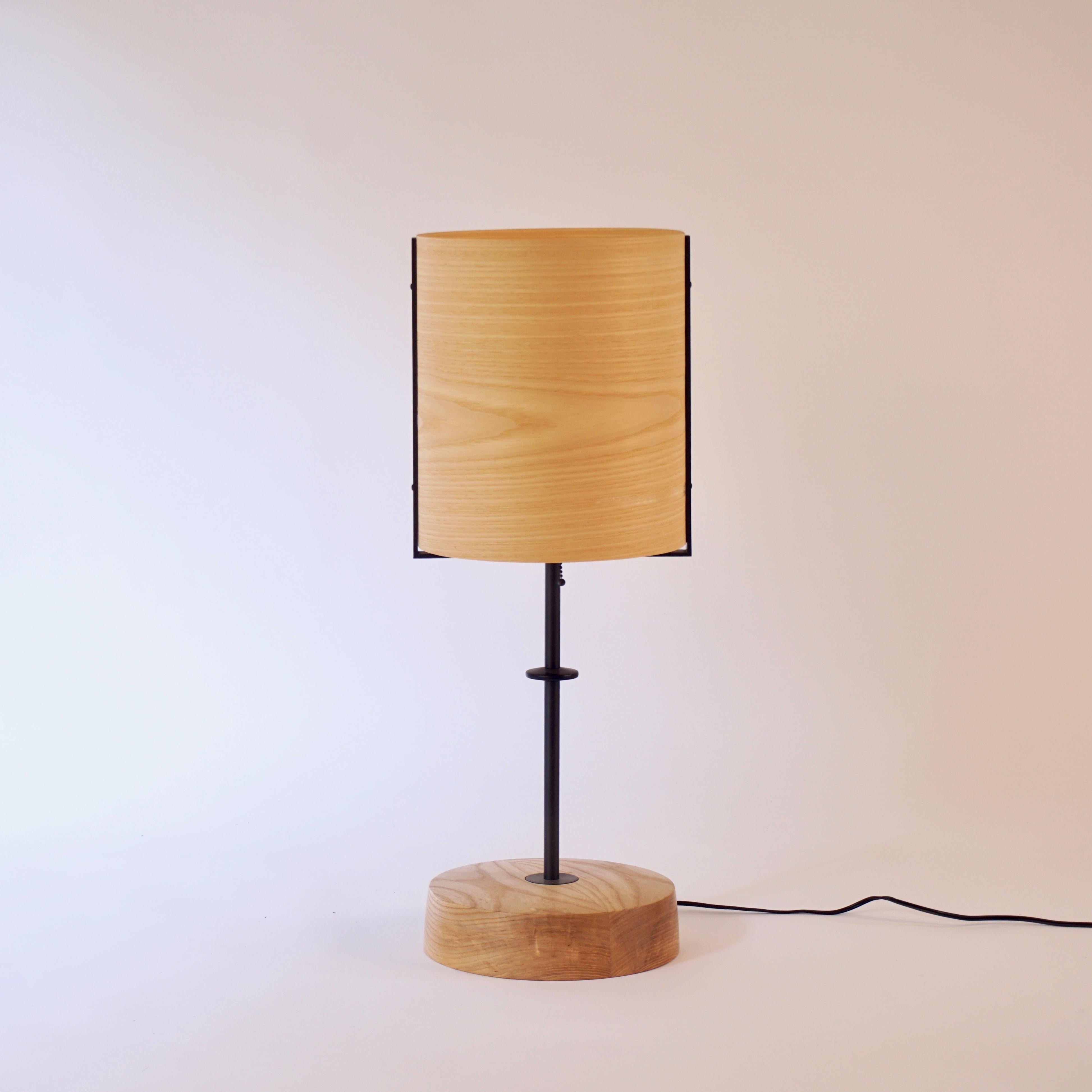 The ash veneer lamp #5 is part of the original Lehrecke Veneer Lighting Collection from 1998. The idea began with the beautiful way light passed through thin wood veneers, mostly local woods. The ash has a lightly yellow glow when lit and the glow