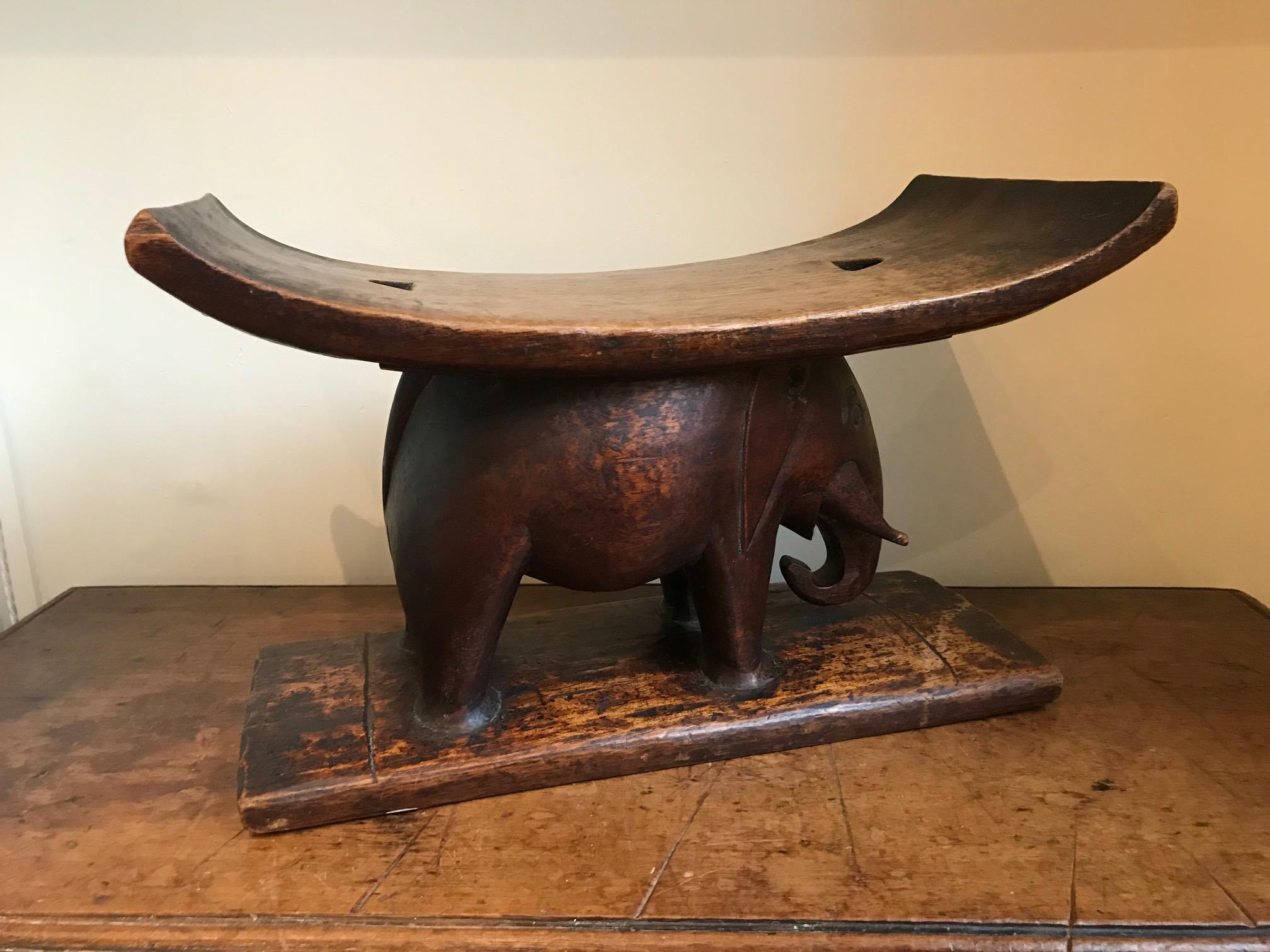 A very well carved Ashanti/Asante decorative tribal stool in the form of an elephant.