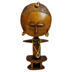 Ashanti Akua’ba Fertility Figure with Cowrie Shells, Ghana, circa 1930