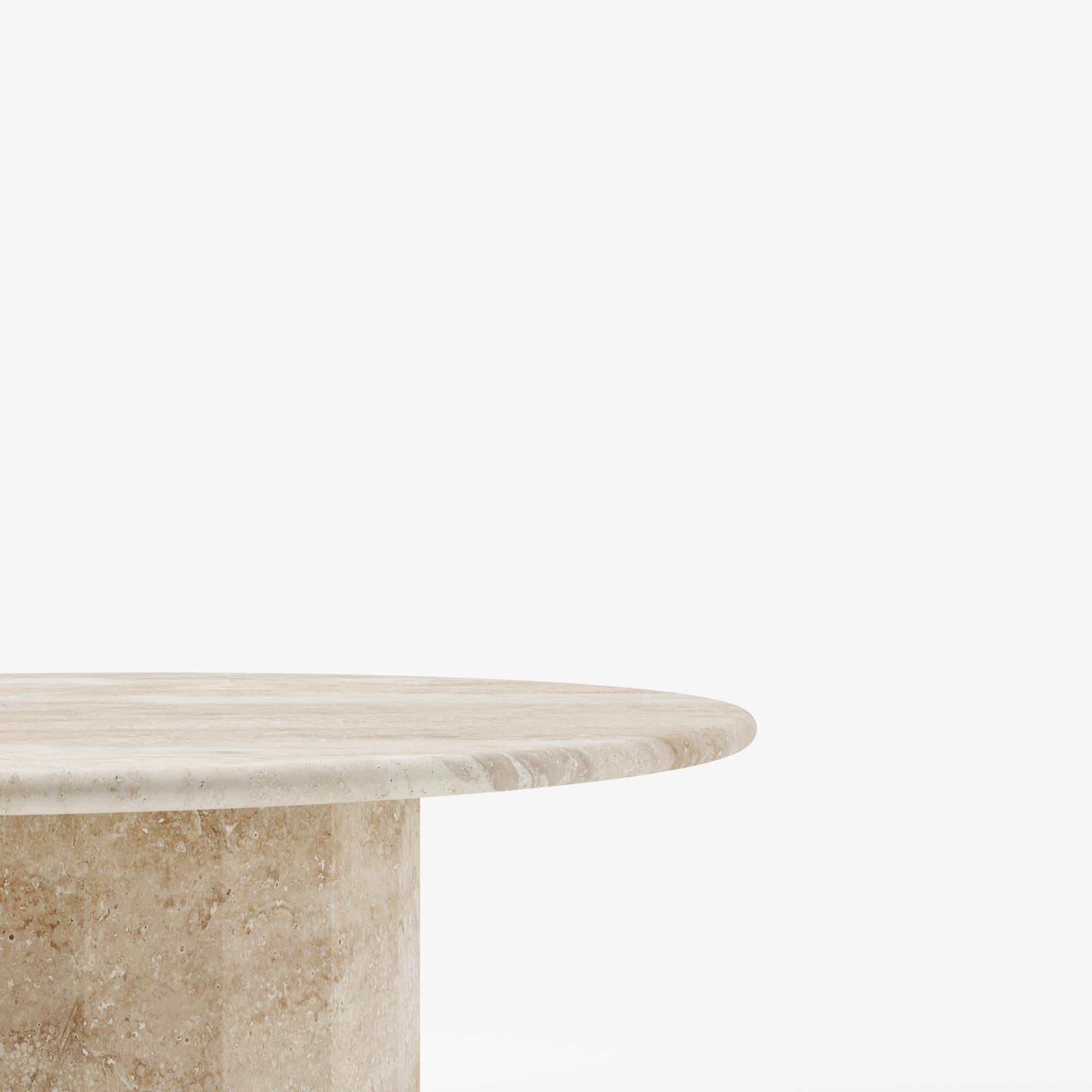 The Ashby Travertine round coffee table is evidence of Lemon’s journey into increasing simplicity. With a design cued entirely by honed and filled Travertine, its round slim top is countered by a strong faceted base – an intentional and definitive