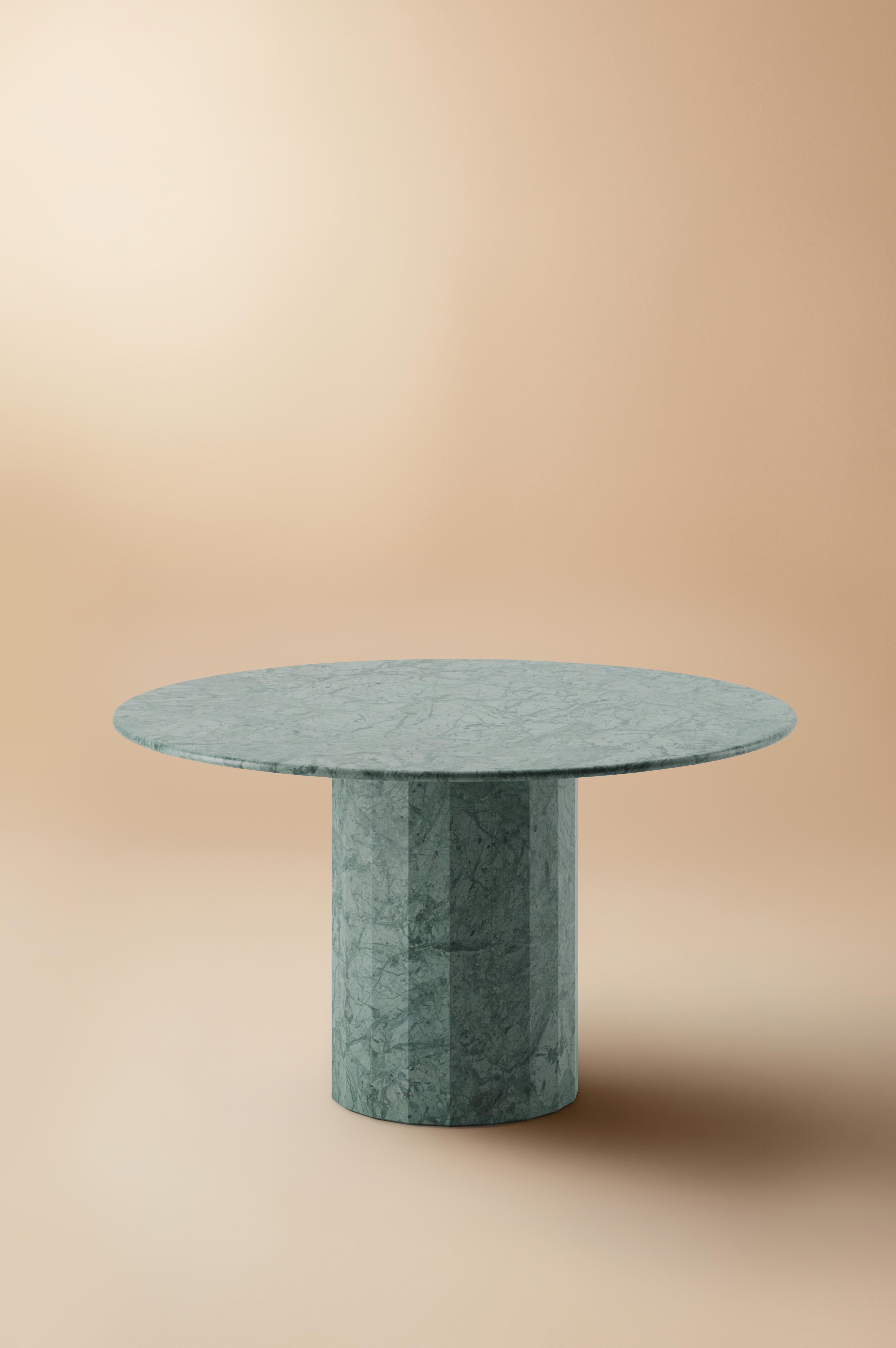 The Ashby marble round dining table is evidence of Lemon’s journey into increasing simplicity. With a design cued entirely by honed Verde Guatemala marble, its round slim top is countered by a strong faceted base – an intentional and definitive