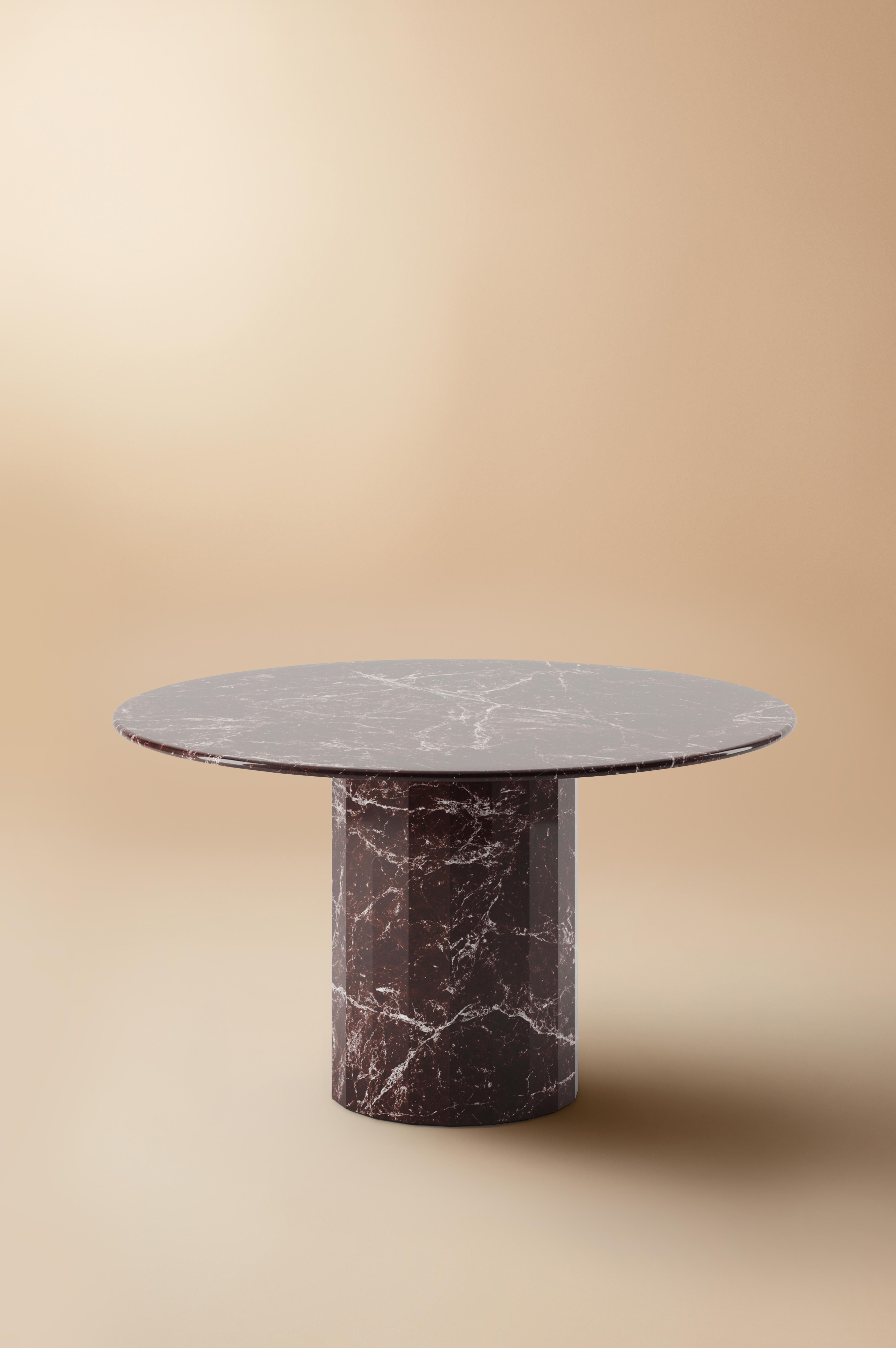 Exemplifying Lemon's unwavering commitment to elegance and artistry, the Ashby round dining dining/hall table encapsulates the brand's ethos with perfection. Its magnificent design showcases the harmonious fusion of meticulous craftsmanship,