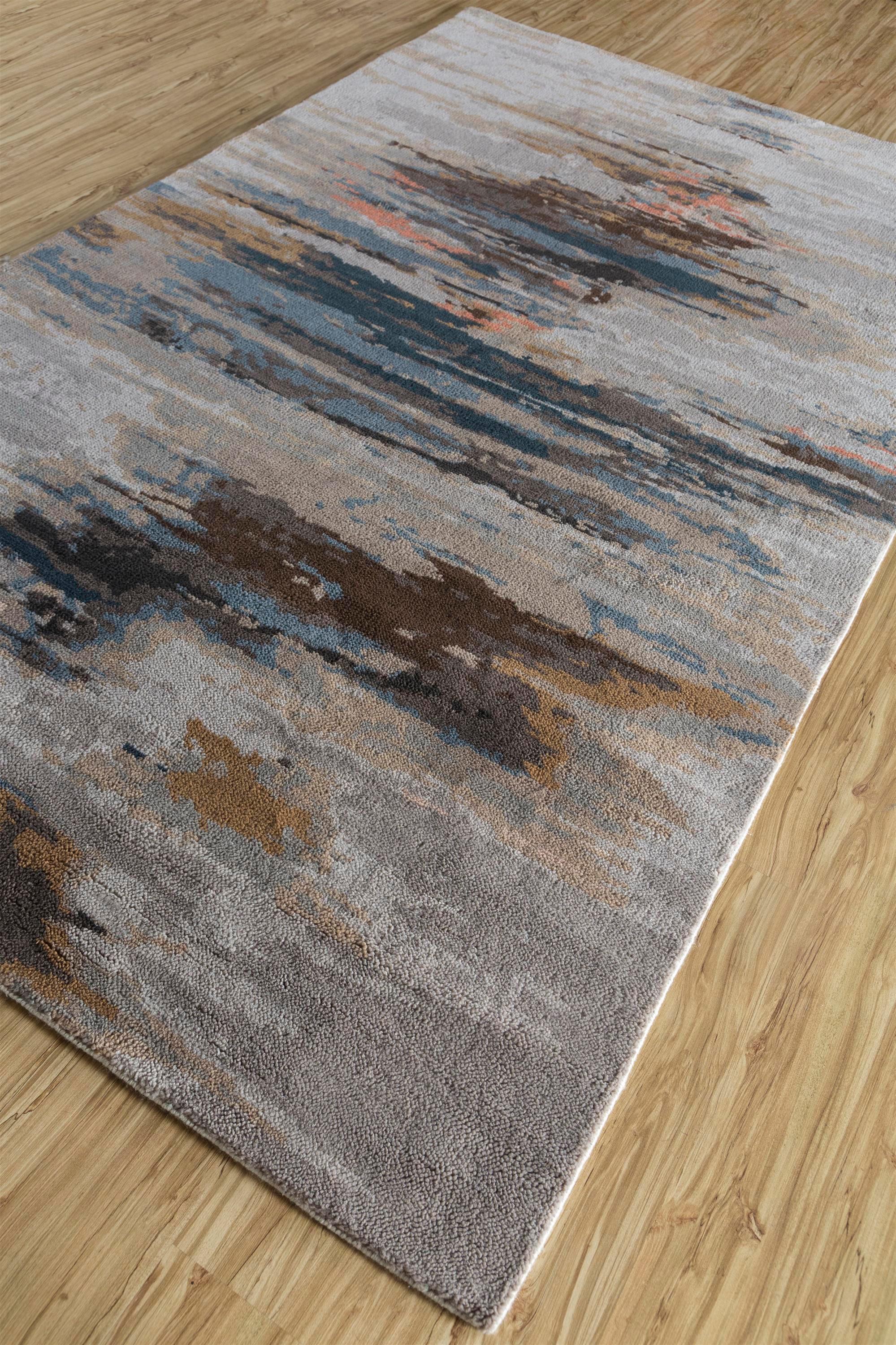 This handmade rug is a stunning fusion of contemporary design and traditional craftsmanship, creating a visual masterpiece that elevates any living space. This rectangular rug boasts a captivating pattern in the elegant hues of ashwood and