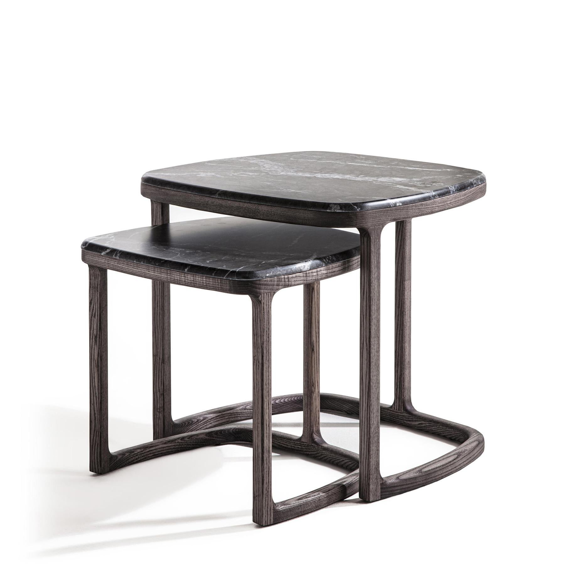 Side table Asher set of 2 with structure in solid ashwood
in stained coffee finish. With dark grey polished marble top.
Measures: A/ L 45.5 x D 41.5 x H 43 cm, price: 2550,00€.
B/ L 57 x D 51.5 x H 52cm, price: 2690,00€
Set of 2 price: 5200,00€.