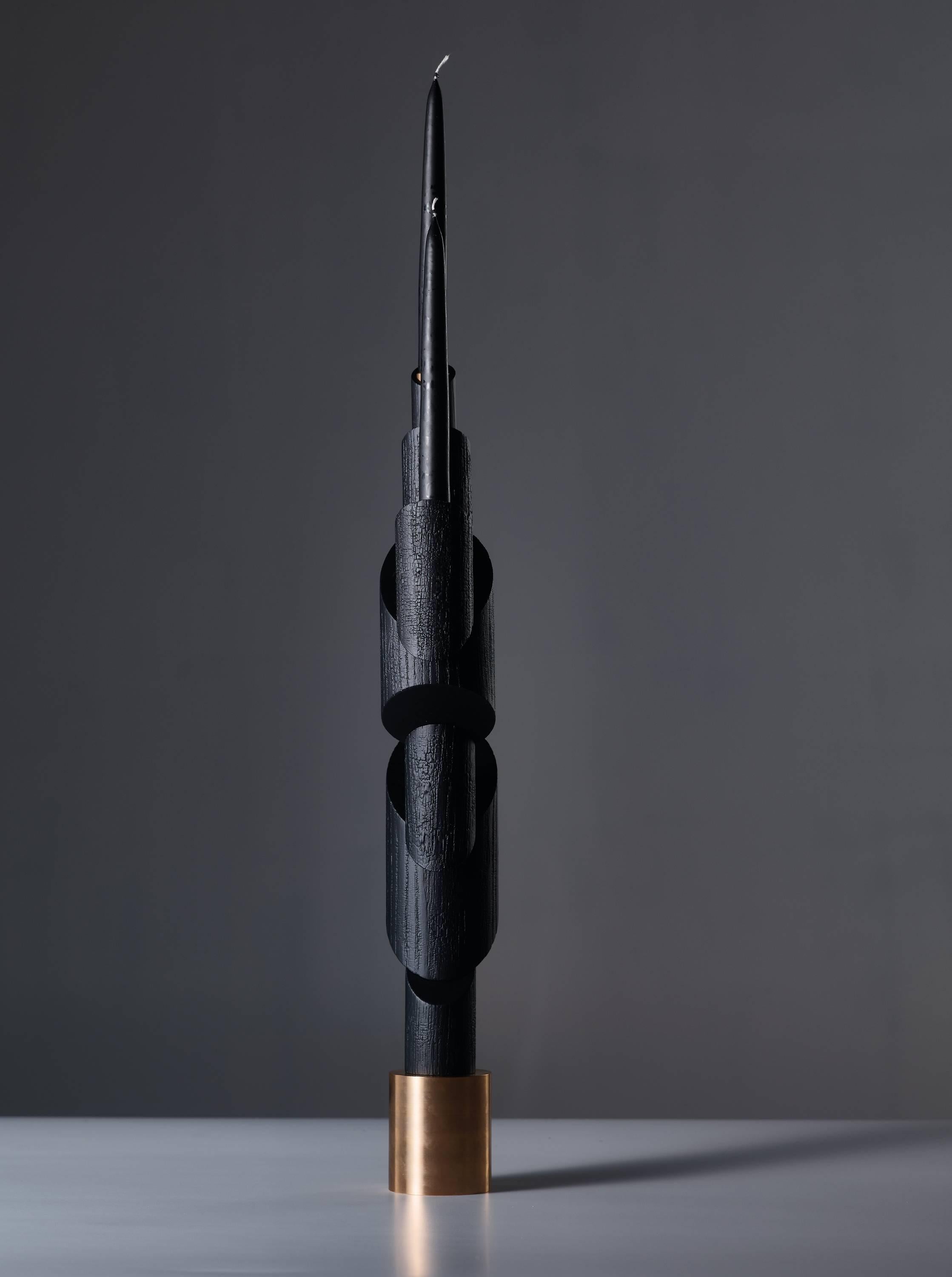 Ashes to Ashes B1, bronze chandelier signed by William Guillon
Signed William Guillon
Limited edition of 99
Signed and numbered
Solid burnt oak / Solid bronze
Dimensions: 65 x 19.7 x 9 cm (Height with candle: 88 cm) 
Hand-sculpted in